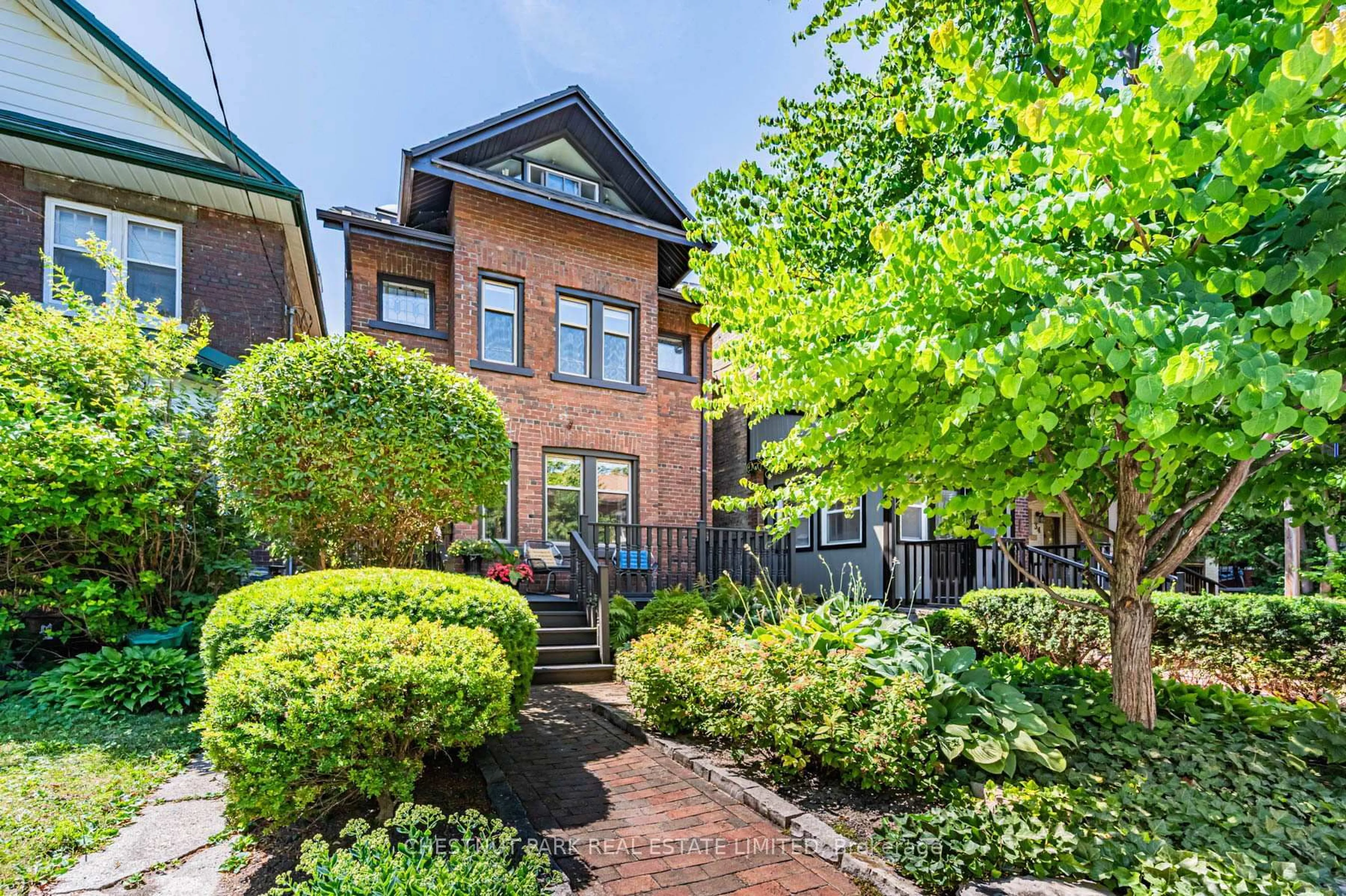 Home with brick exterior material, street for 30 Coady Ave, Toronto Ontario M4M 2Y8