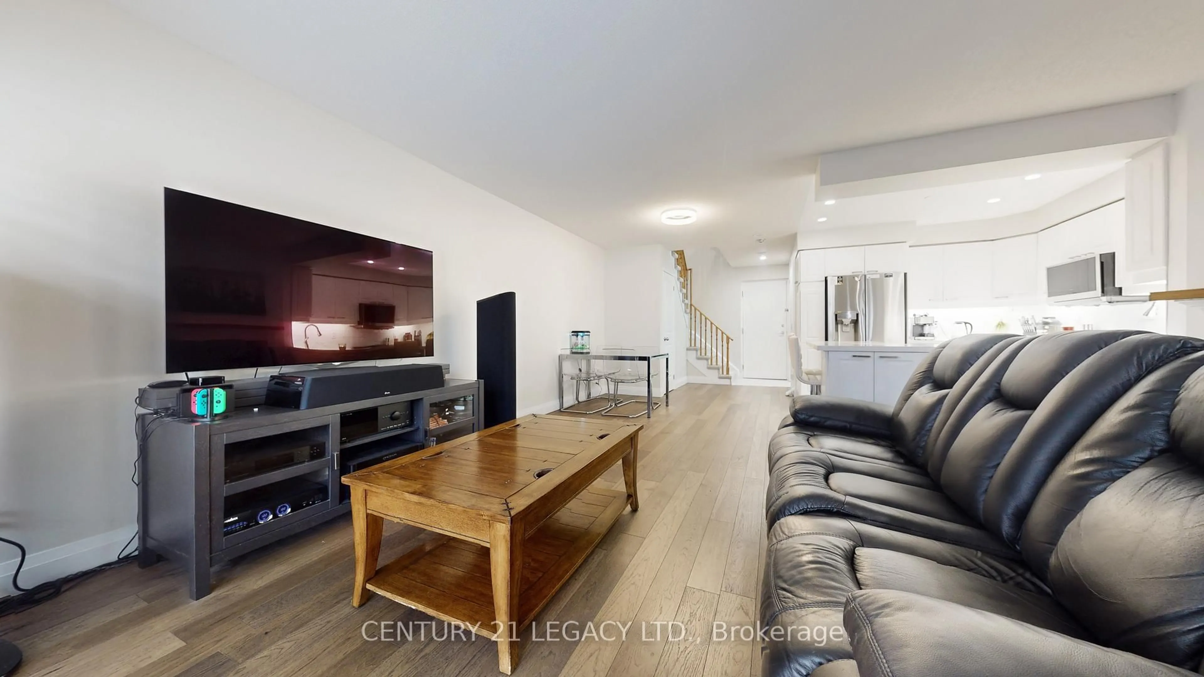 Living room with furniture, wood/laminate floor for 1400 The Esplanade North #419, Pickering Ontario L1V 6V2