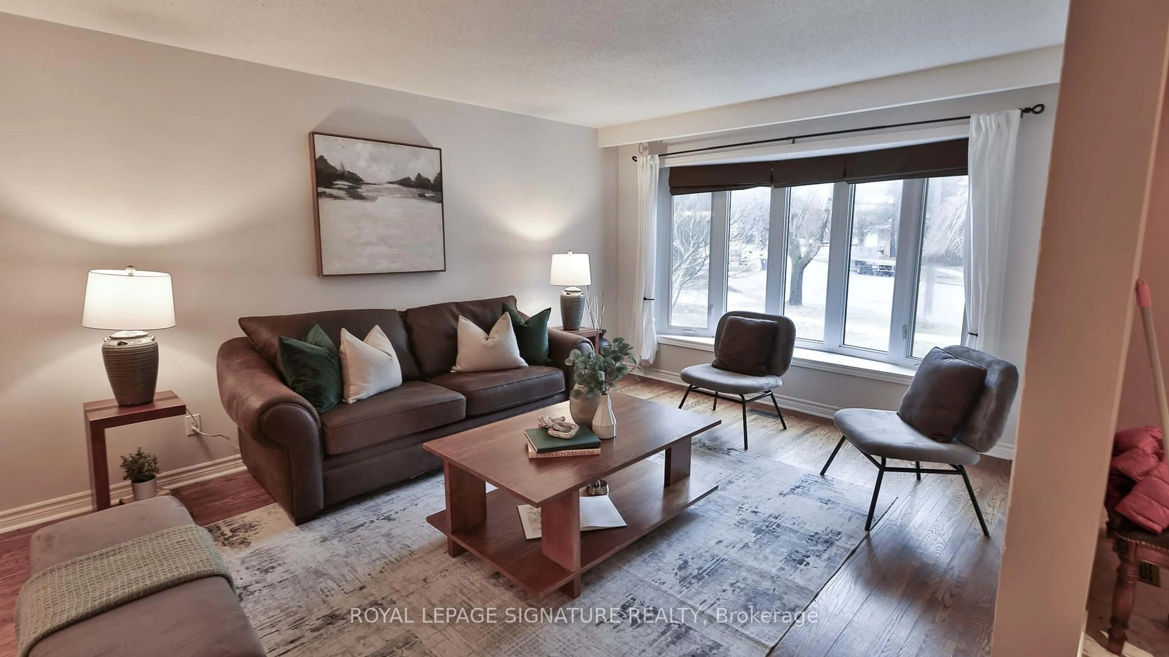 Living room with furniture, wood/laminate floor for 56 Satchell Blvd, Toronto Ontario M1C 3B4