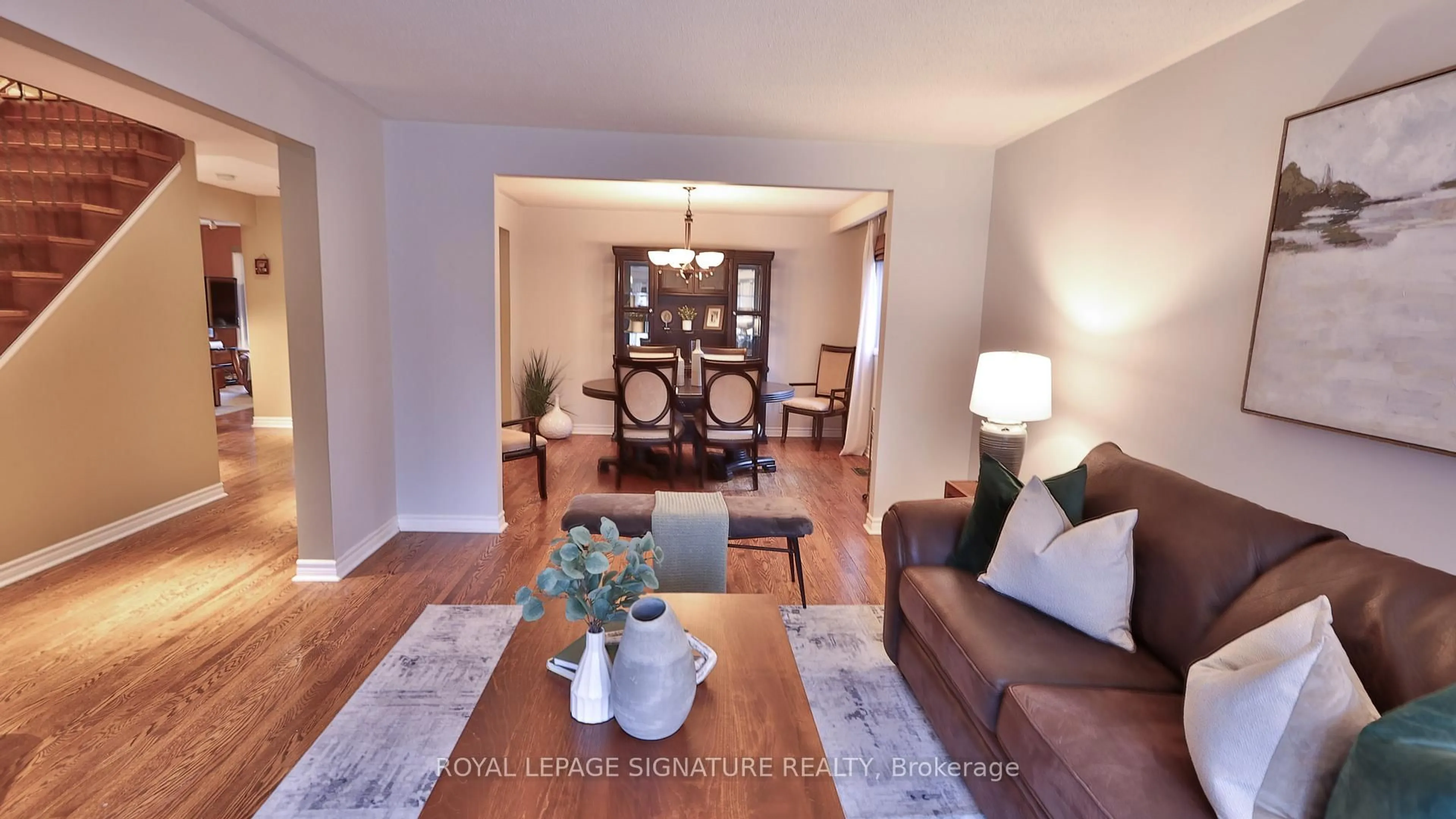 Living room with furniture, wood/laminate floor for 56 Satchell Blvd, Toronto Ontario M1C 3B4