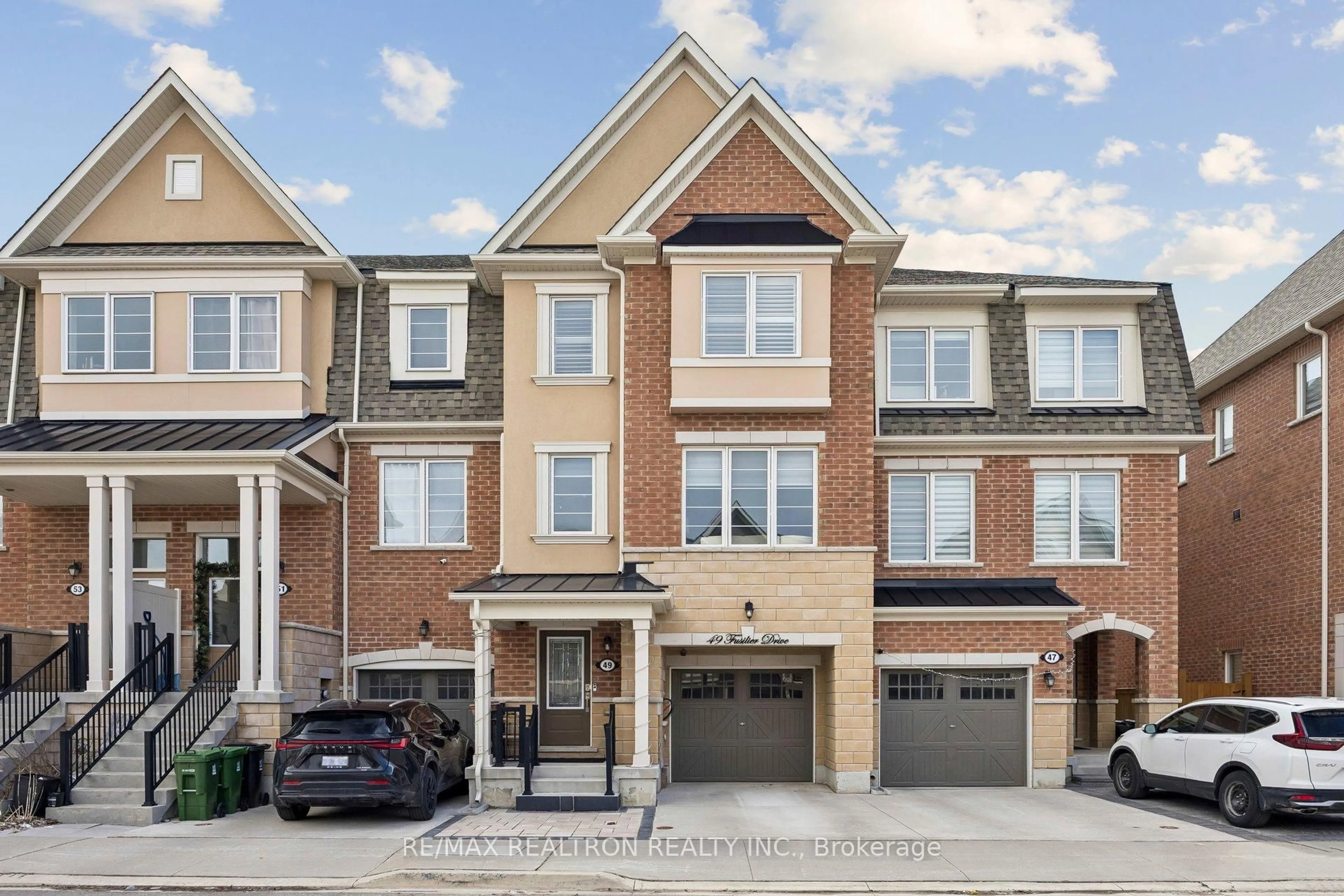 Home with brick exterior material, street for 49 Fusilier Dr, Toronto Ontario M1L 0J3