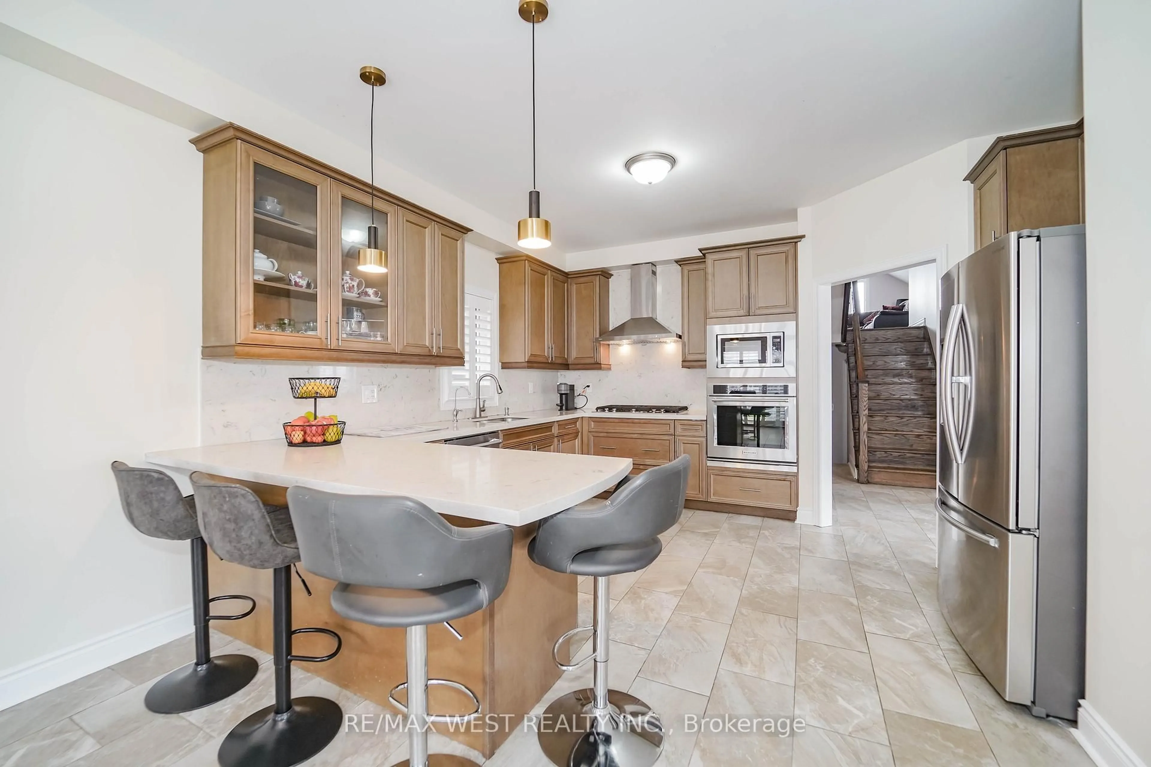 Open concept kitchen, ceramic/tile floor for 63 Sharplin Dr, Ajax Ontario L1Z 0P4