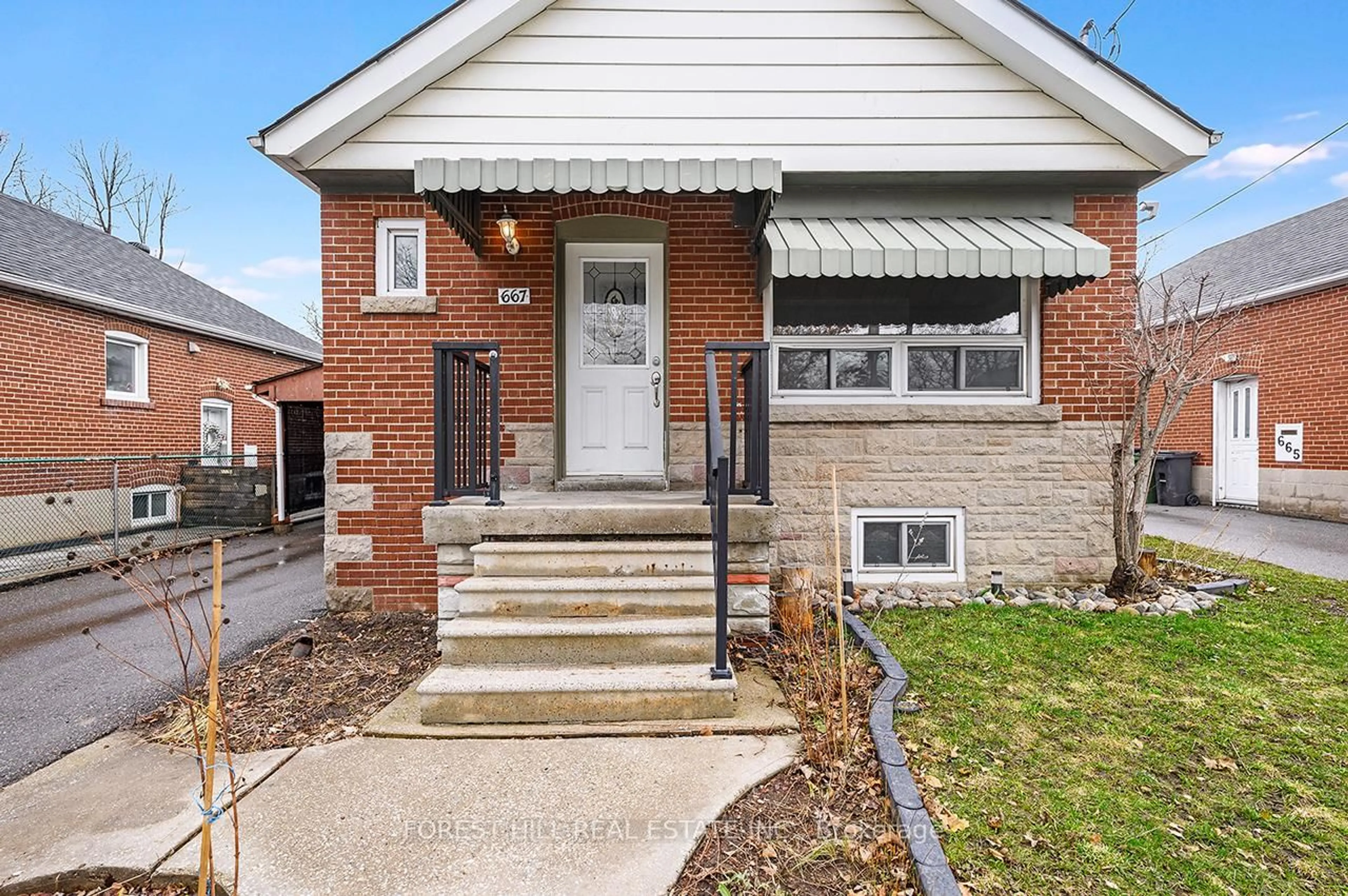 Home with brick exterior material, street for 667 Pharmacy Ave, Toronto Ontario M1L 3H7