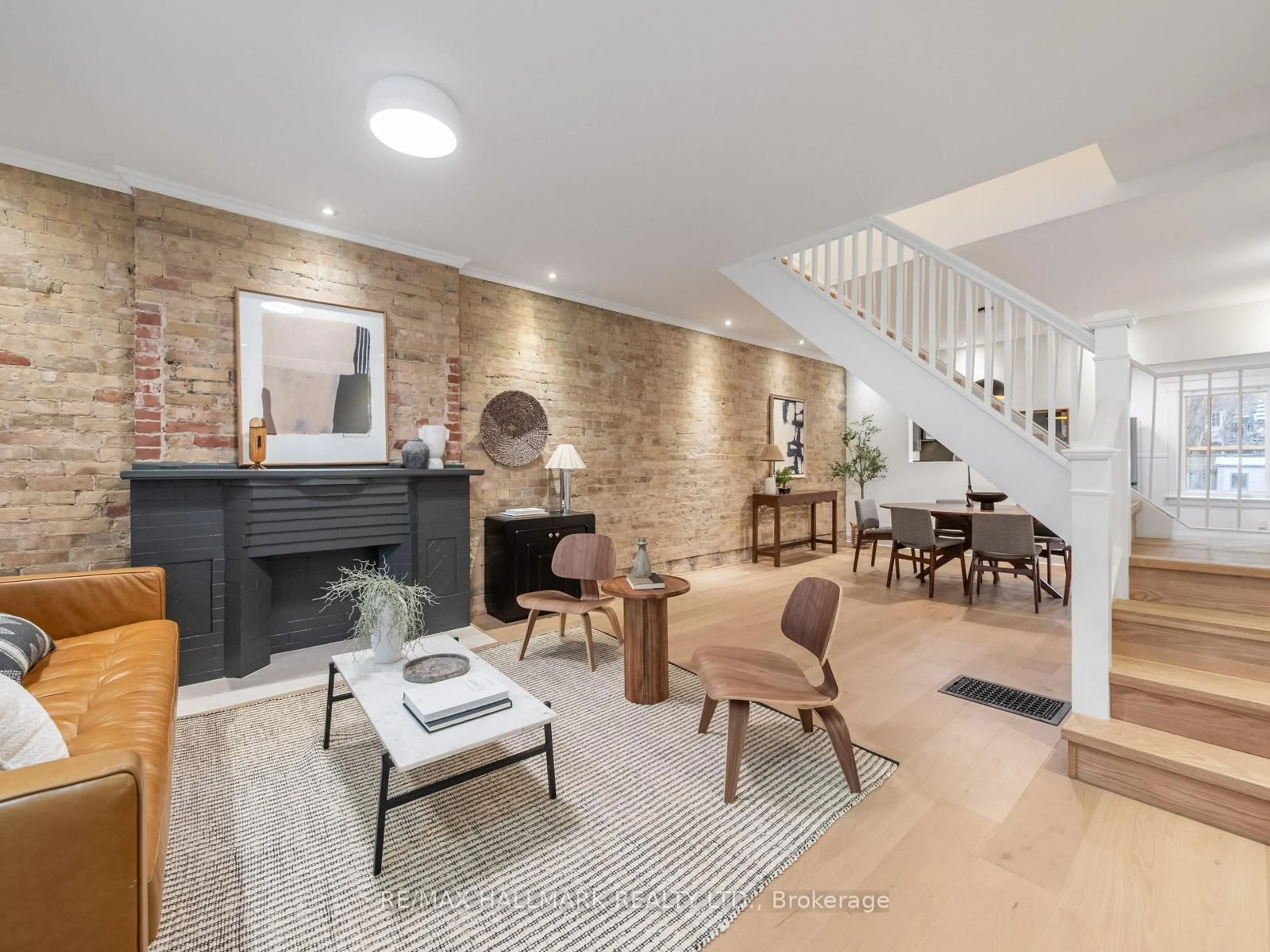 Living room with furniture, unknown for 24 Richard Ave, Toronto Ontario M4L 1W9