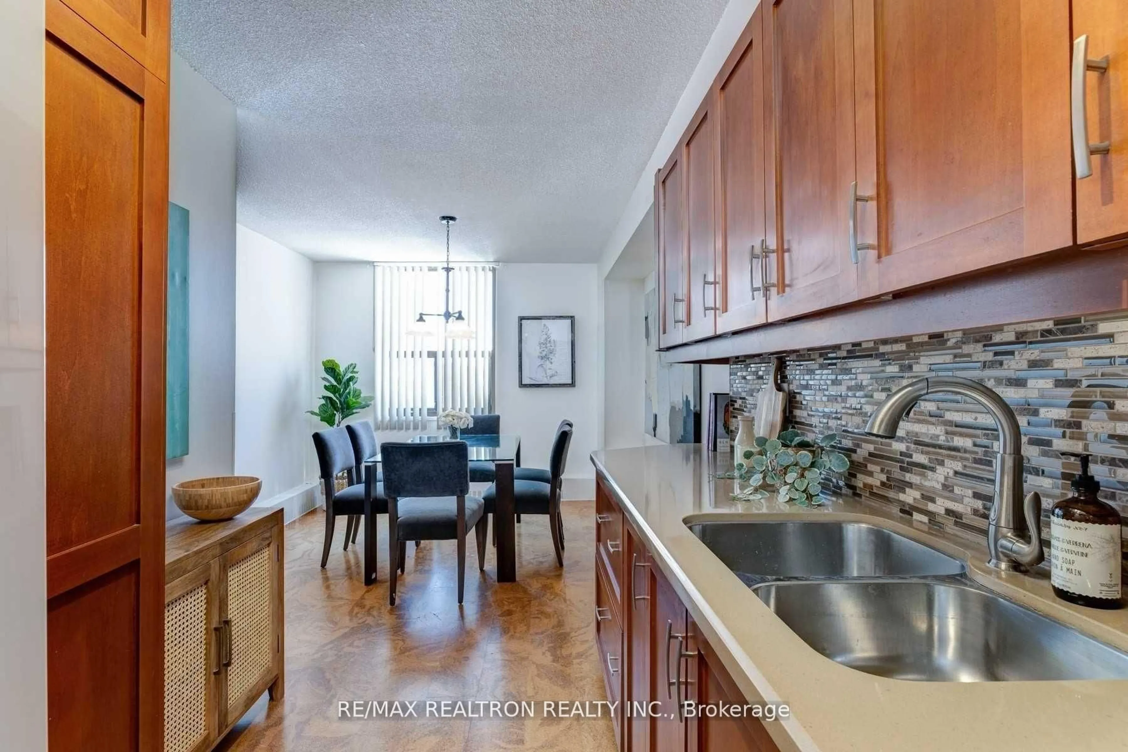 Open concept kitchen, unknown for 90 Ling Rd #404, Toronto Ontario M1E 4Y3