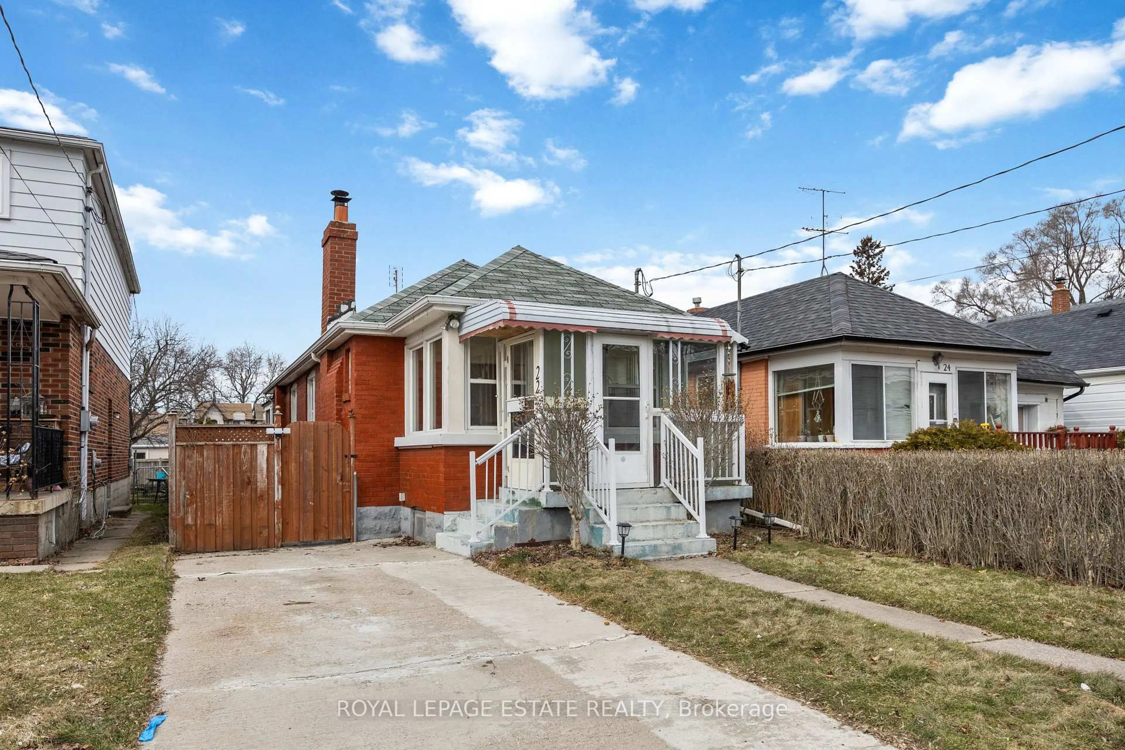 Home with brick exterior material, street for 22 Medford Ave, Toronto Ontario M1L 4G2