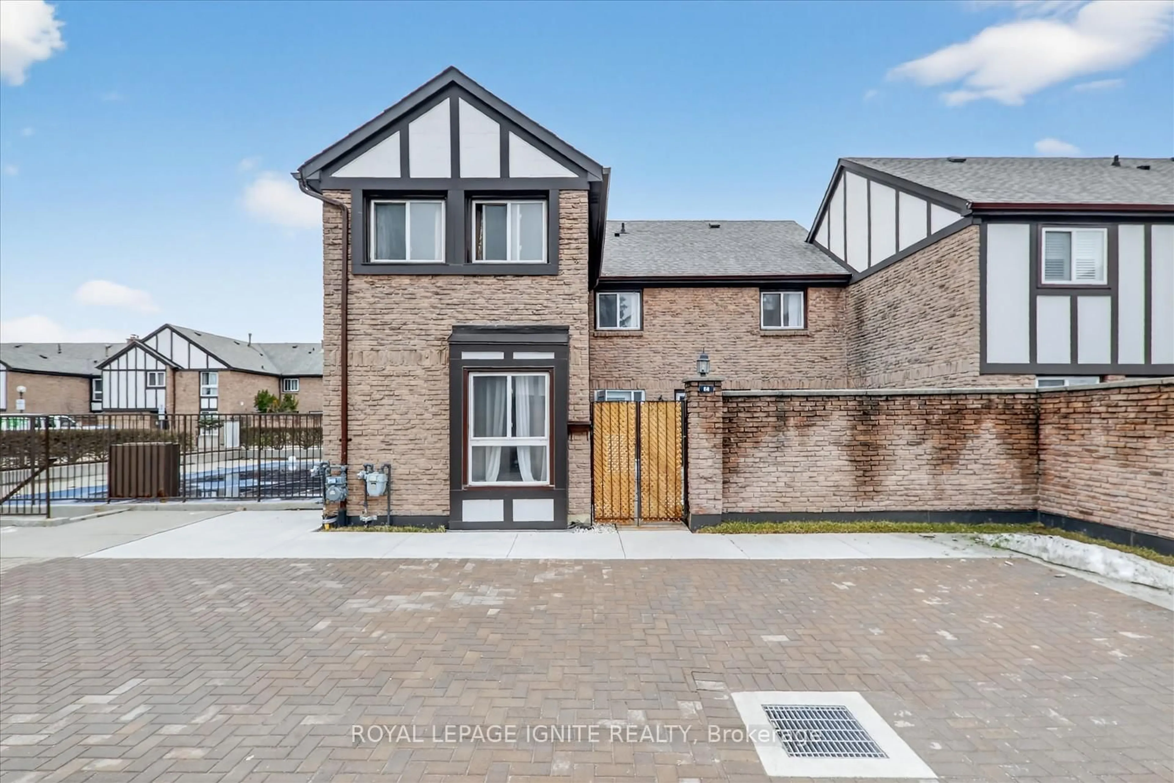 Home with brick exterior material, street for 2 Dailing Gate #56, Toronto Ontario M1B 1Z8