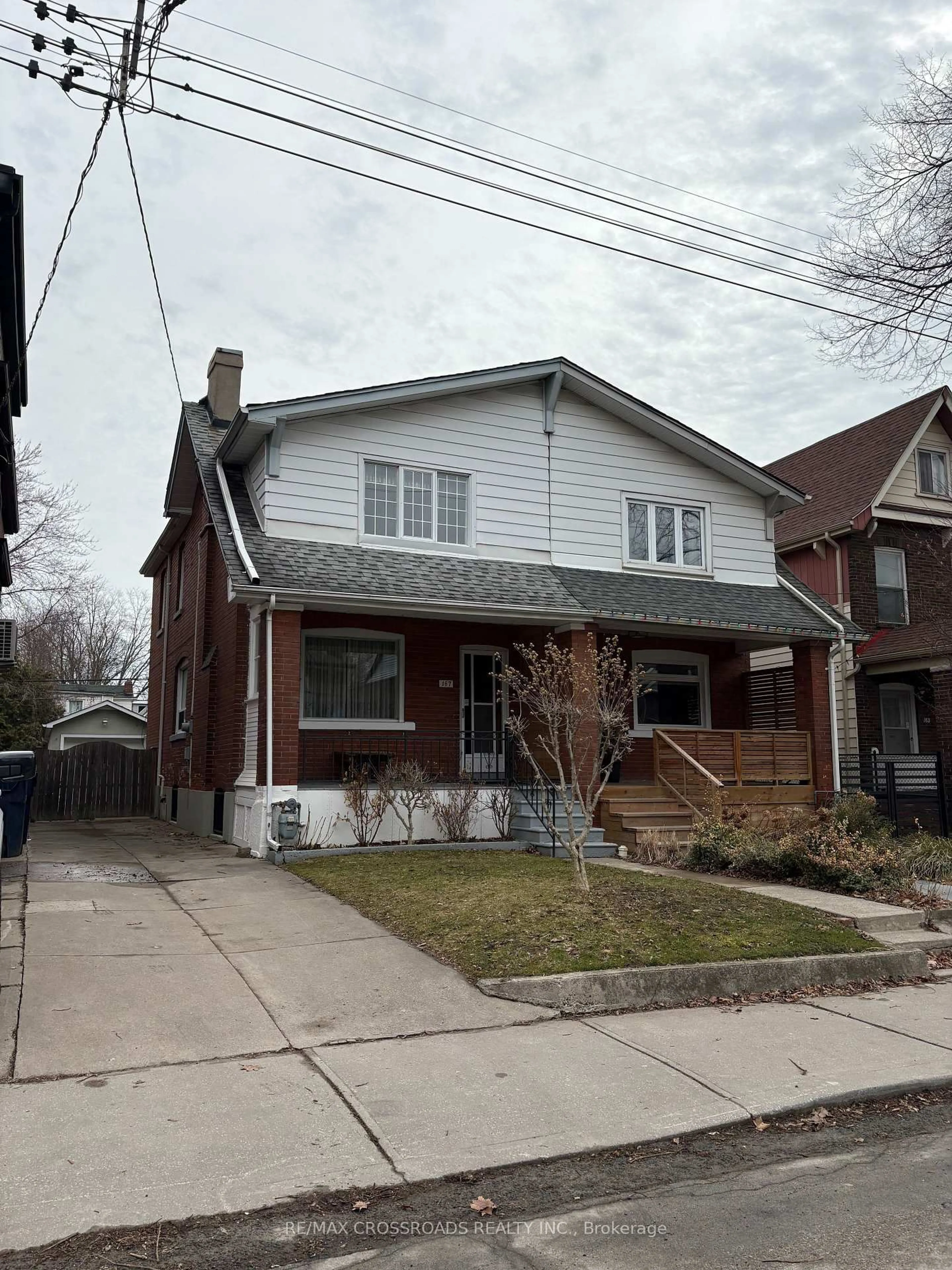Home with brick exterior material, street for 167 Woodfield Rd, Toronto Ontario M4L 2W8