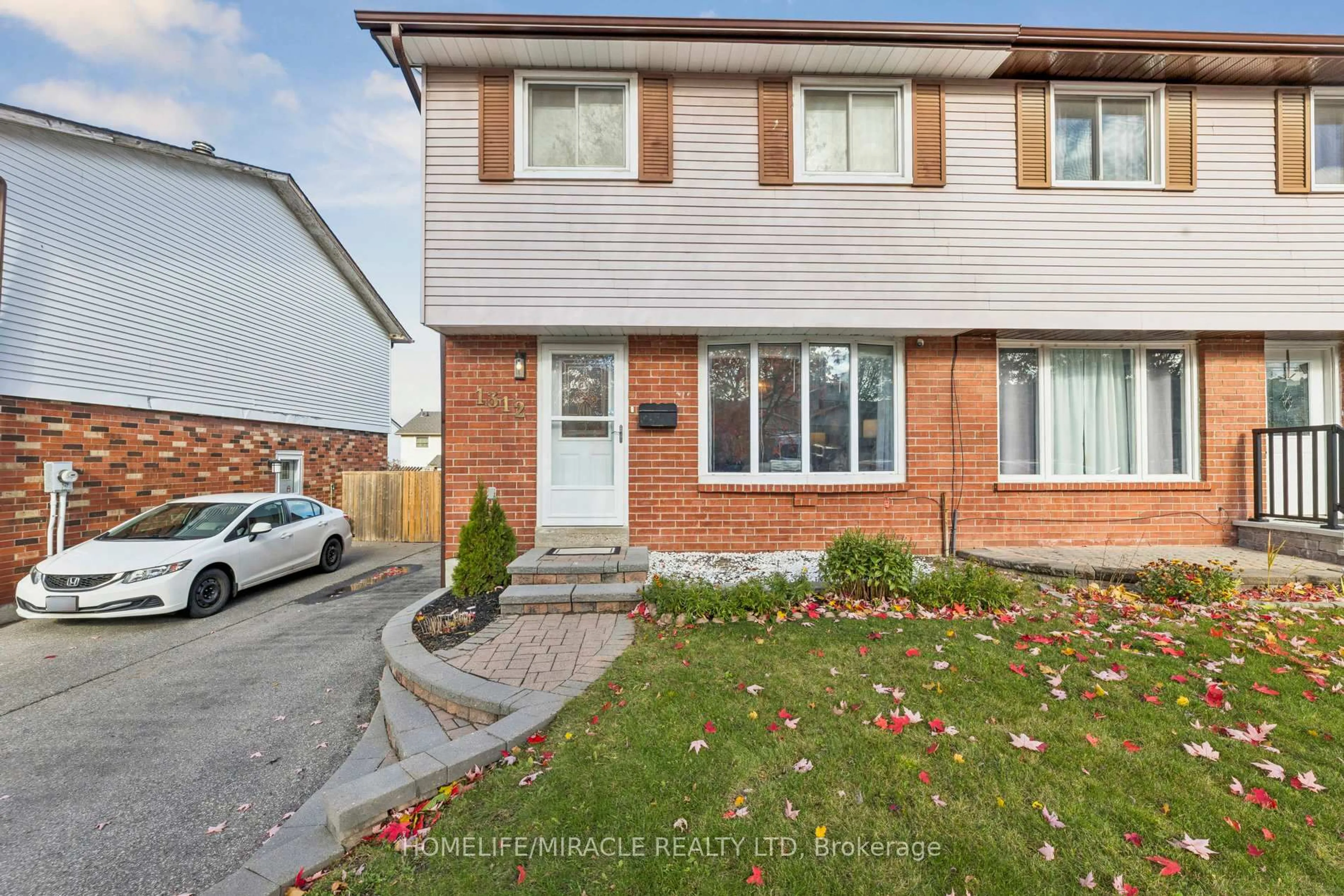 Home with brick exterior material, street for 1312 Cherrydown Dr, Oshawa Ontario L1H 8C8