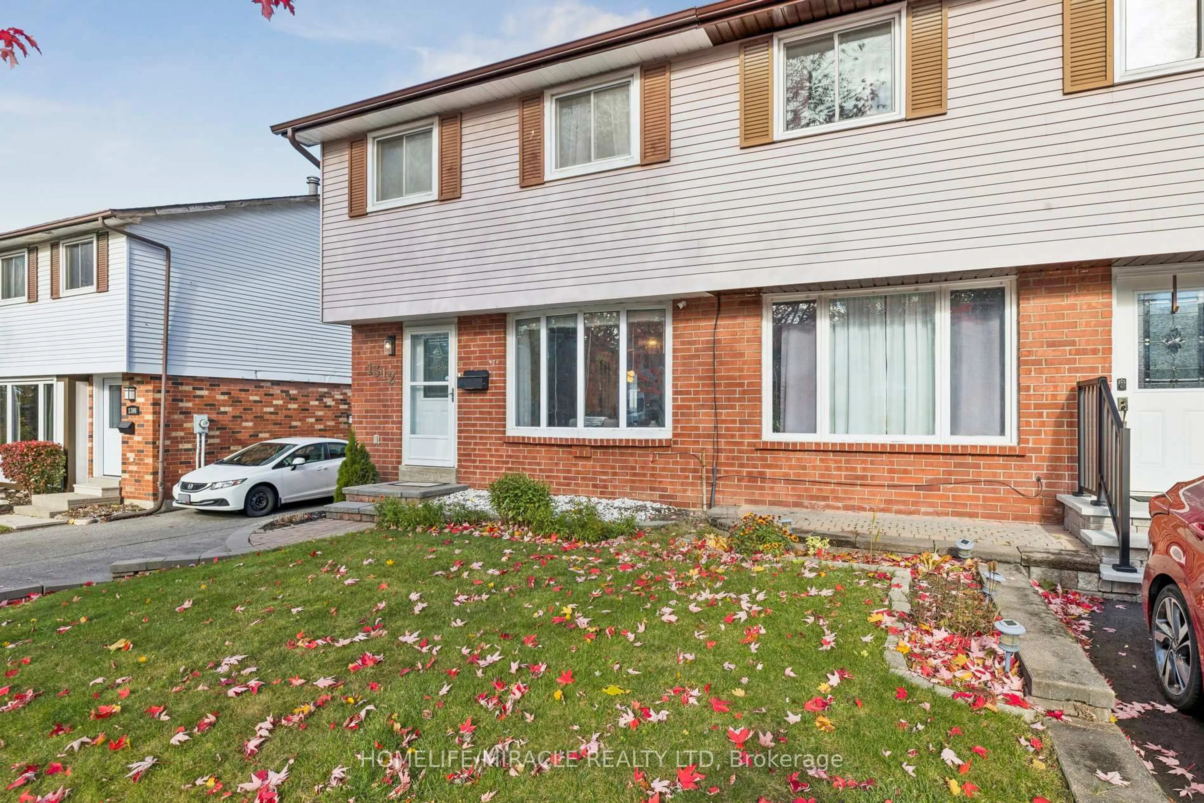 Home with brick exterior material, street for 1312 Cherrydown Dr, Oshawa Ontario L1H 8C8