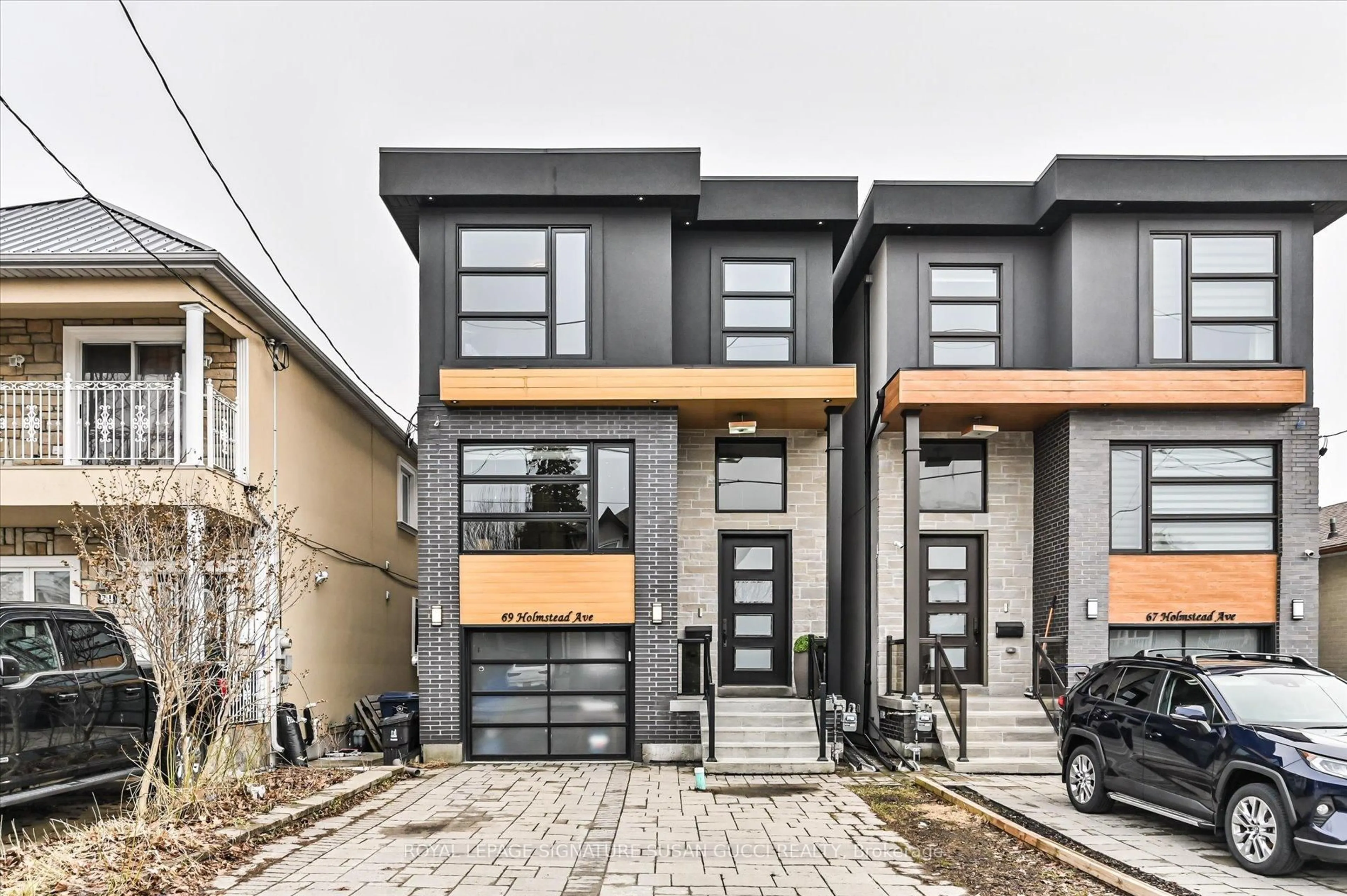Home with brick exterior material, street for 69 Holmstead Ave, Toronto Ontario M4B 1T3