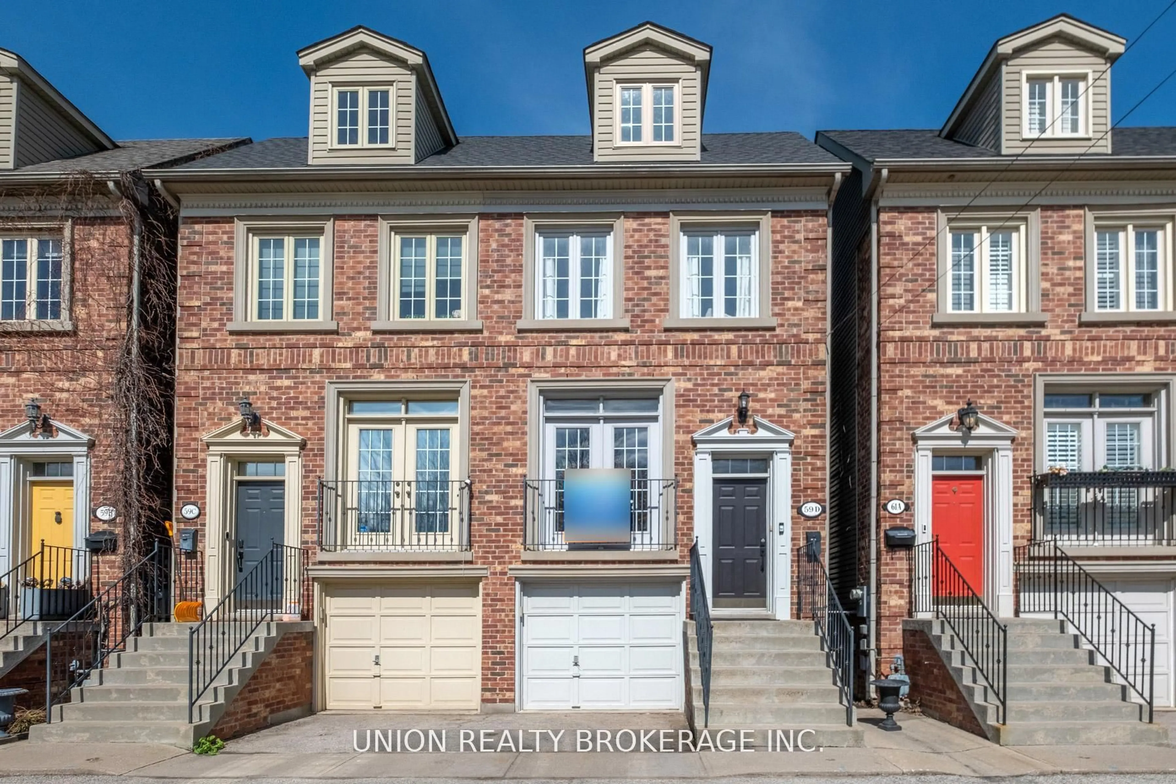 Home with brick exterior material, street for 59D Woodbine Ave, Toronto Ontario M4L 3P1