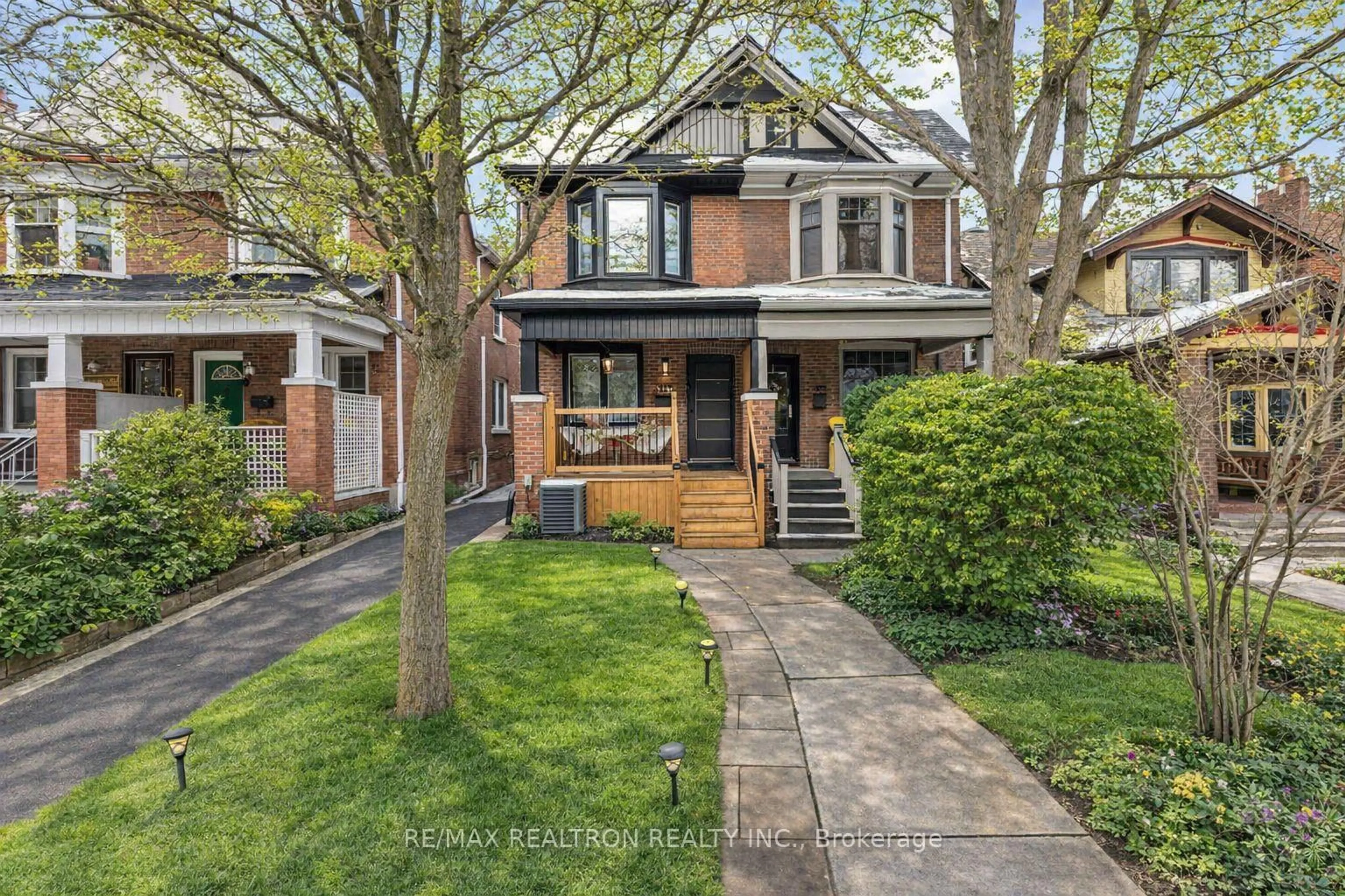 Home with brick exterior material, street for 111 Glenmore Rd, Toronto Ontario M4L 3M2