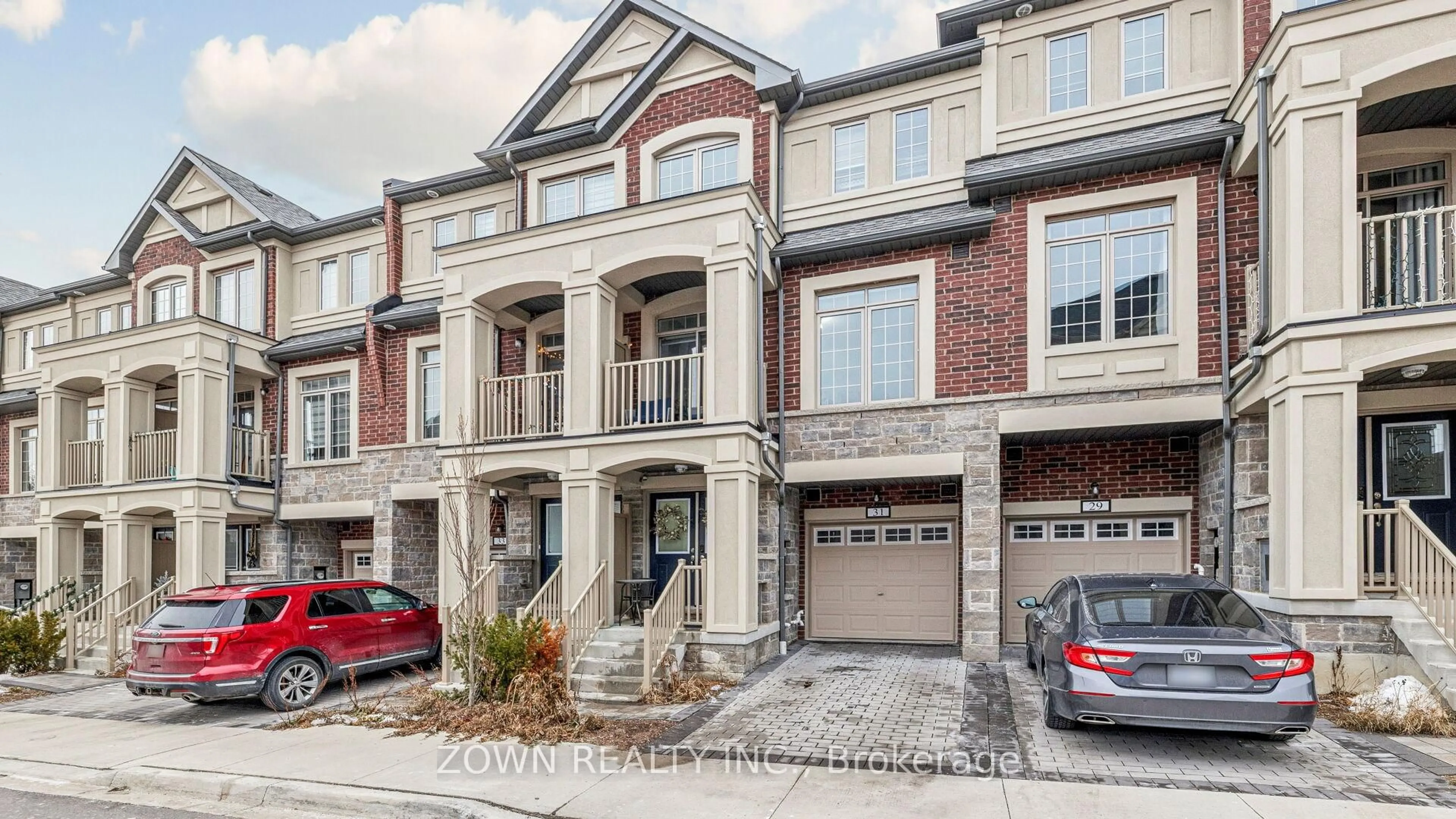 Home with brick exterior material, street for 31 Healthcote Lane, Ajax Ontario L1Z 1V0