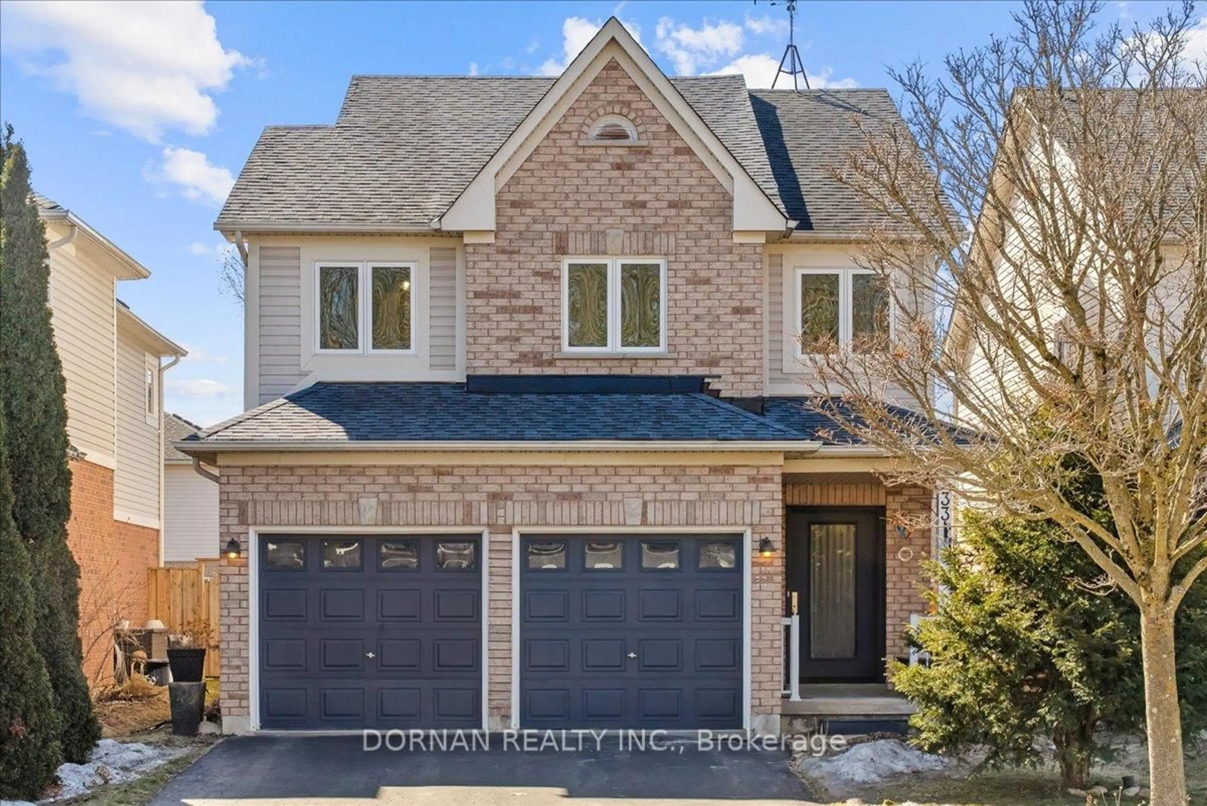 Home with brick exterior material, street for 33 Solmar Ave, Whitby Ontario L1R 2Z6