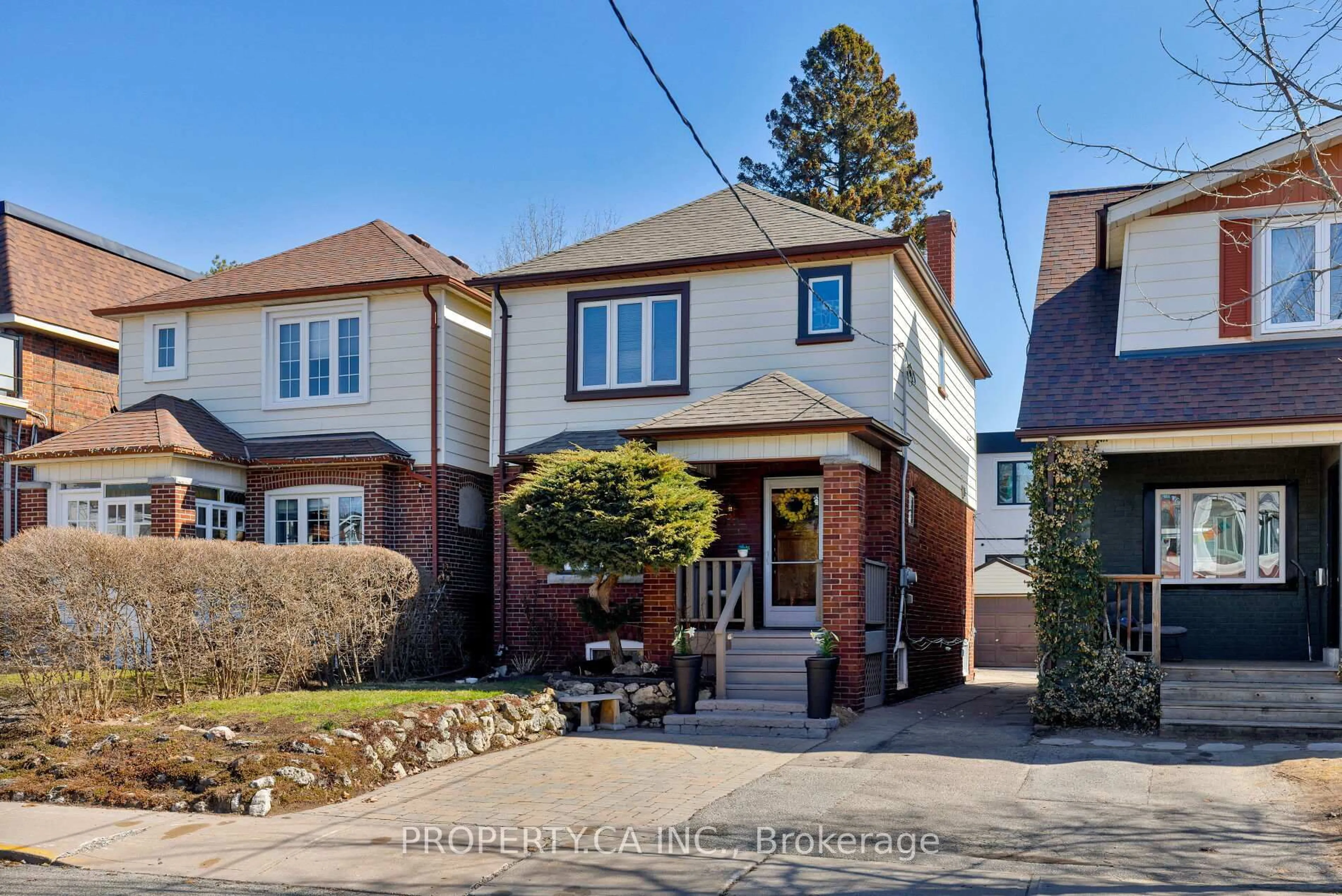 Home with brick exterior material, street for 313 Monarch Park Ave, Toronto Ontario M4J 4T2