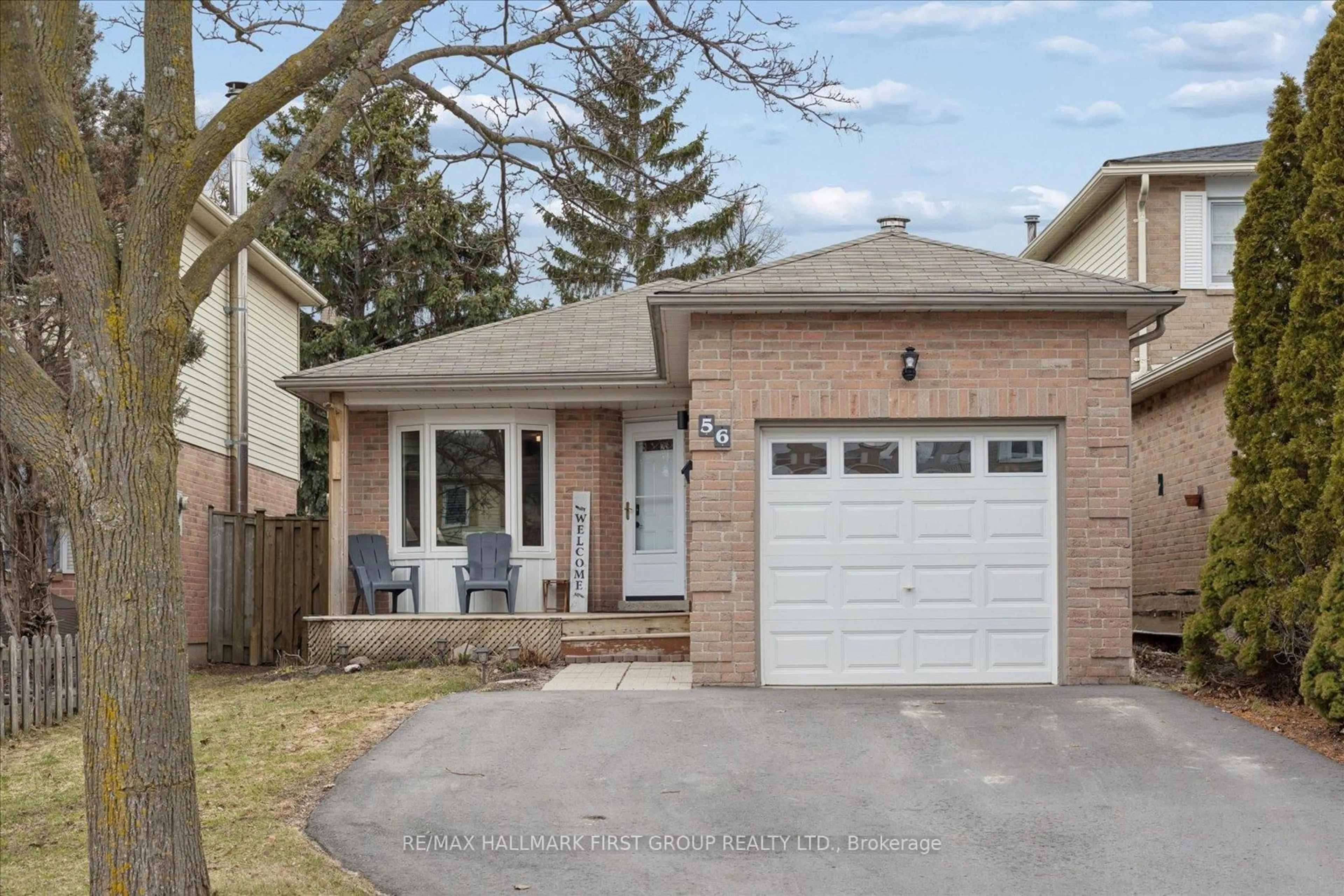 Home with brick exterior material, street for 56 Longstaff Dr, Ajax Ontario L1S 5J7