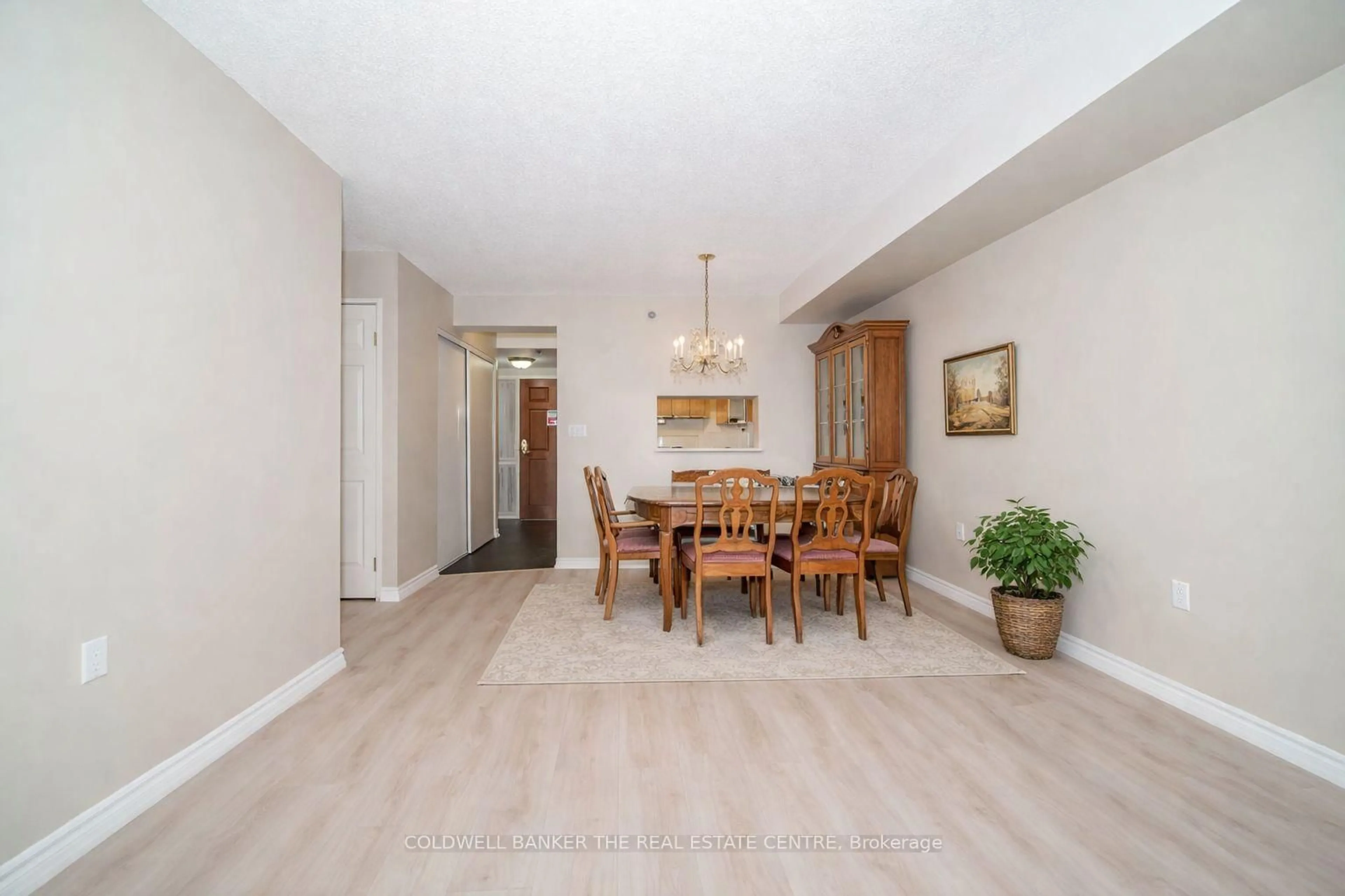 Dining room, wood/laminate floor for 115 Bonis Ave #408, Toronto Ontario M1T 3S4