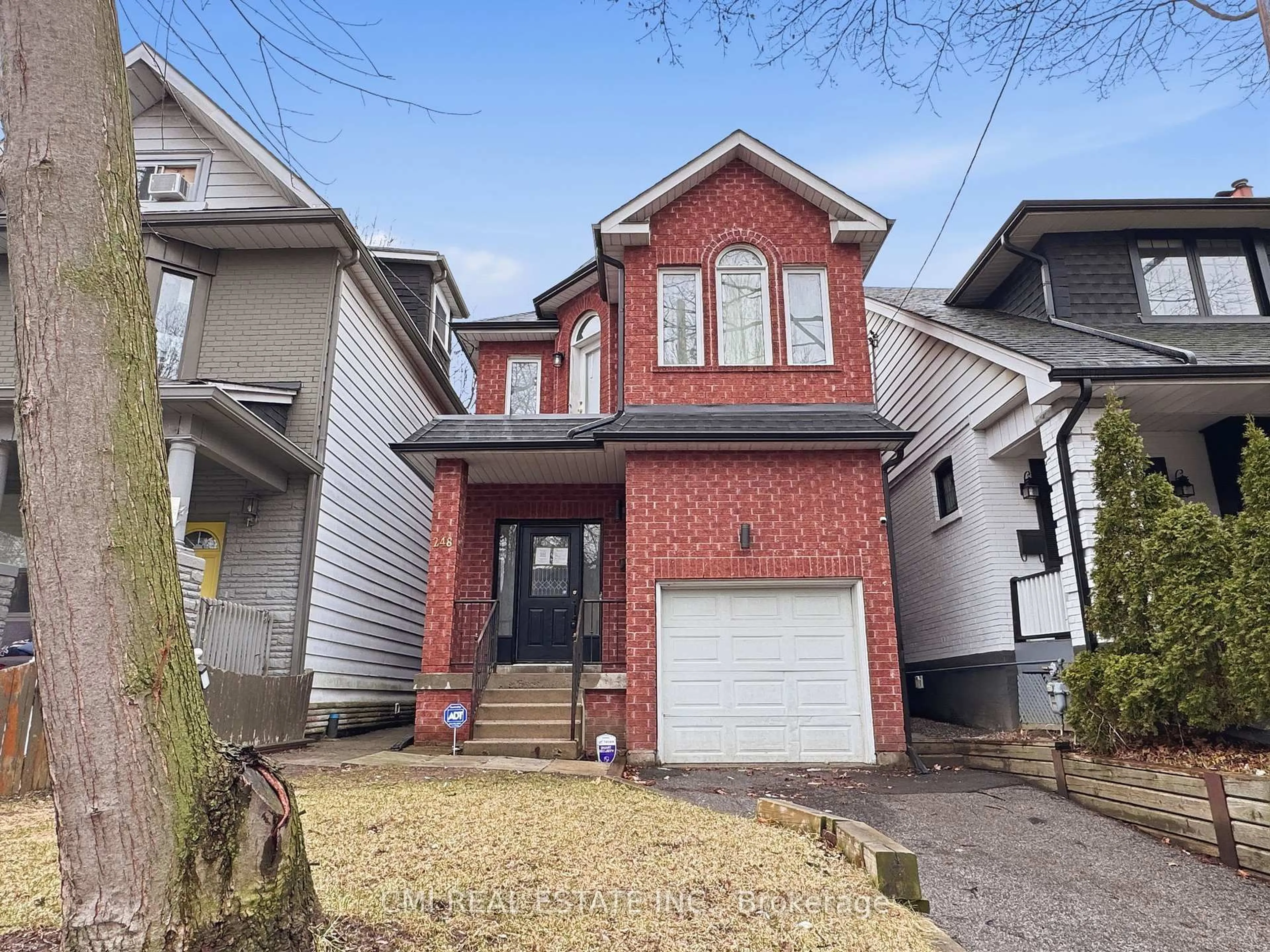 Home with brick exterior material, street for 248 Ashdale Ave, Toronto Ontario M4L 2Y9