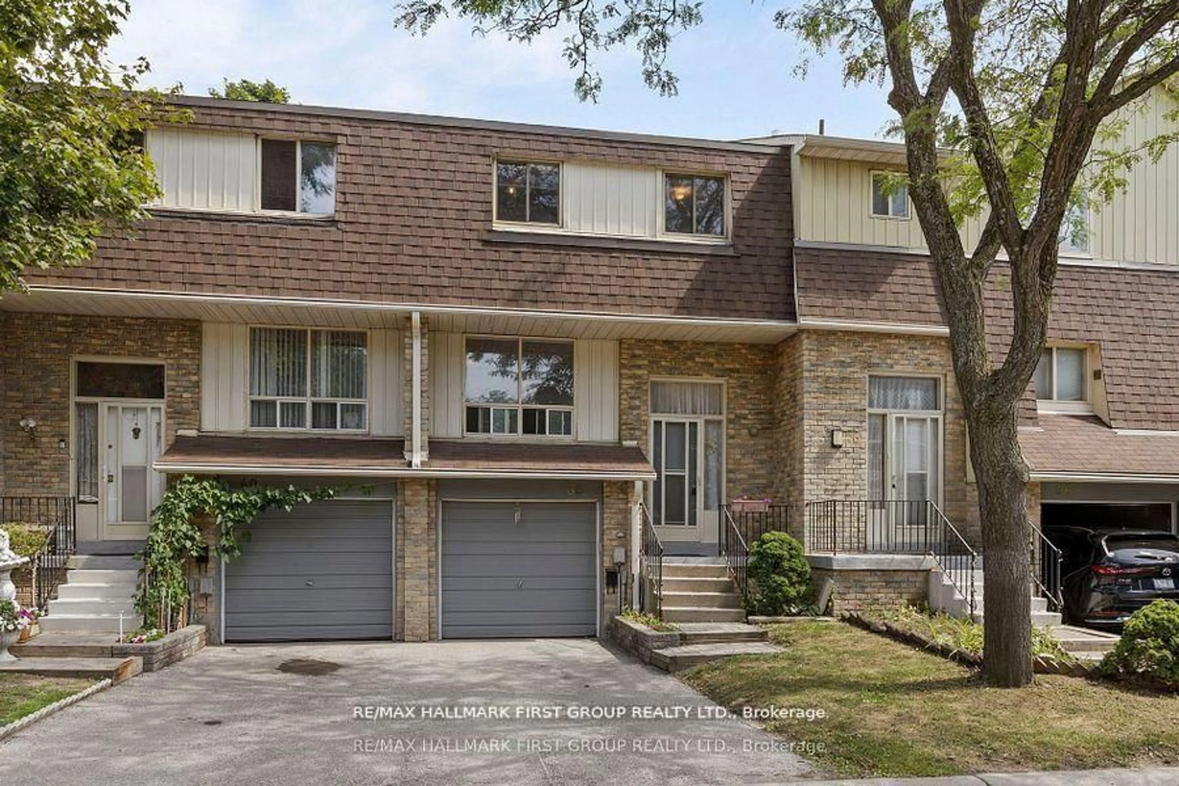 Home with brick exterior material, street for 371 Orton Park Rd #38, Toronto Ontario M1G 3V1