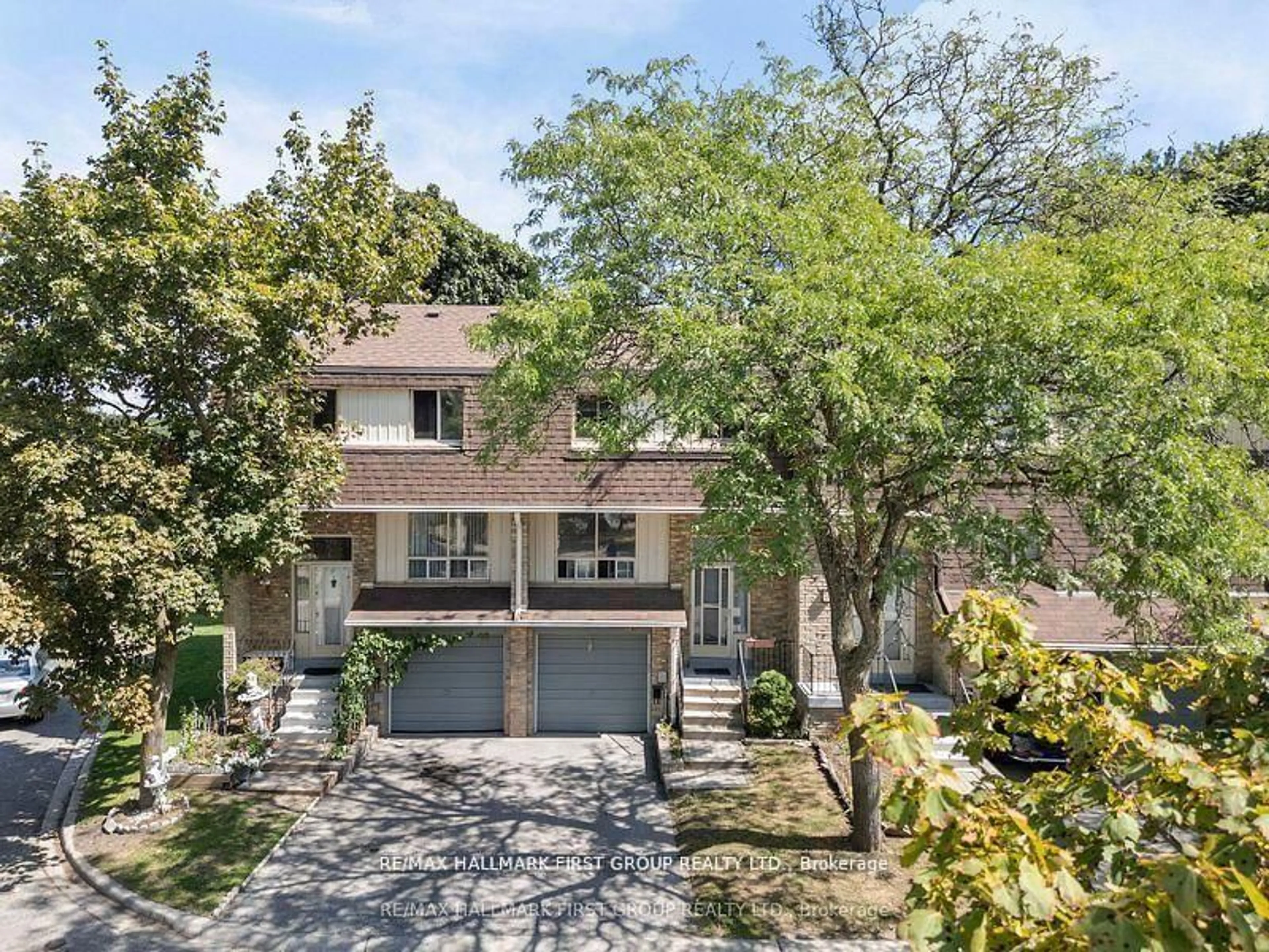 A pic from outside/outdoor area/front of a property/back of a property/a pic from drone, street for 371 Orton Park Rd #38, Toronto Ontario M1G 3V1