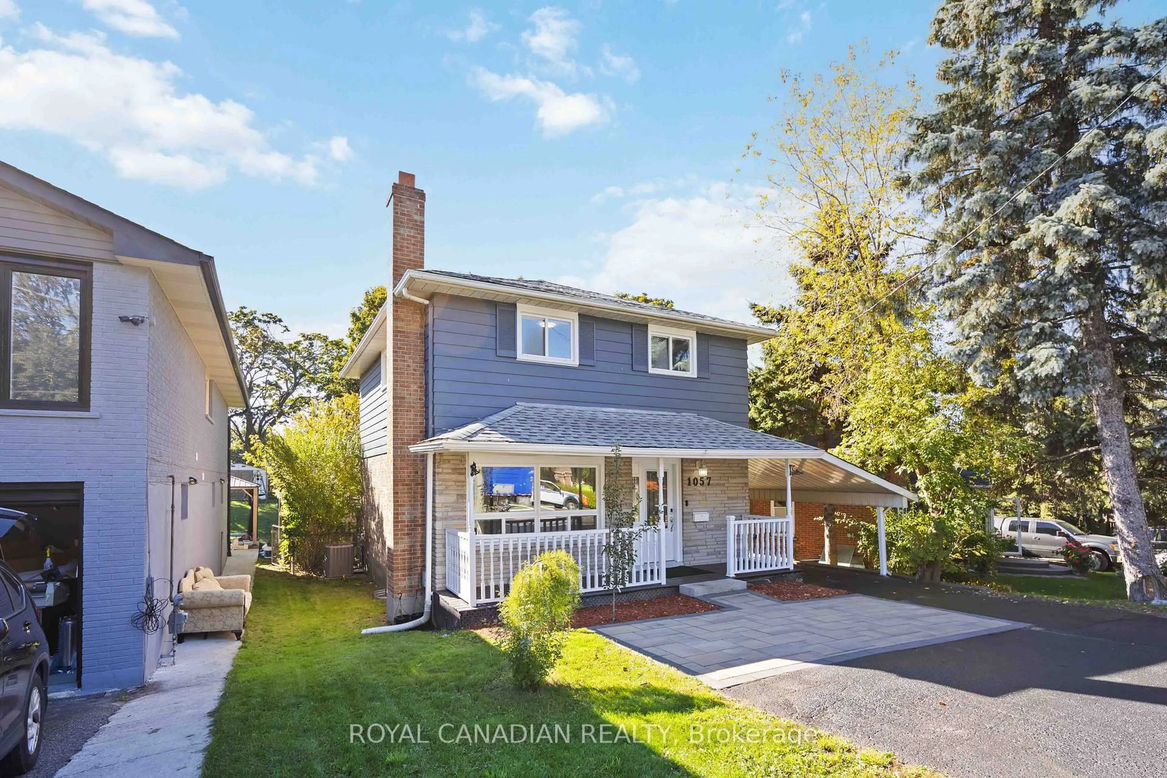 Home with vinyl exterior material, street for 1057 King St, Oshawa Ontario L1H 1H6