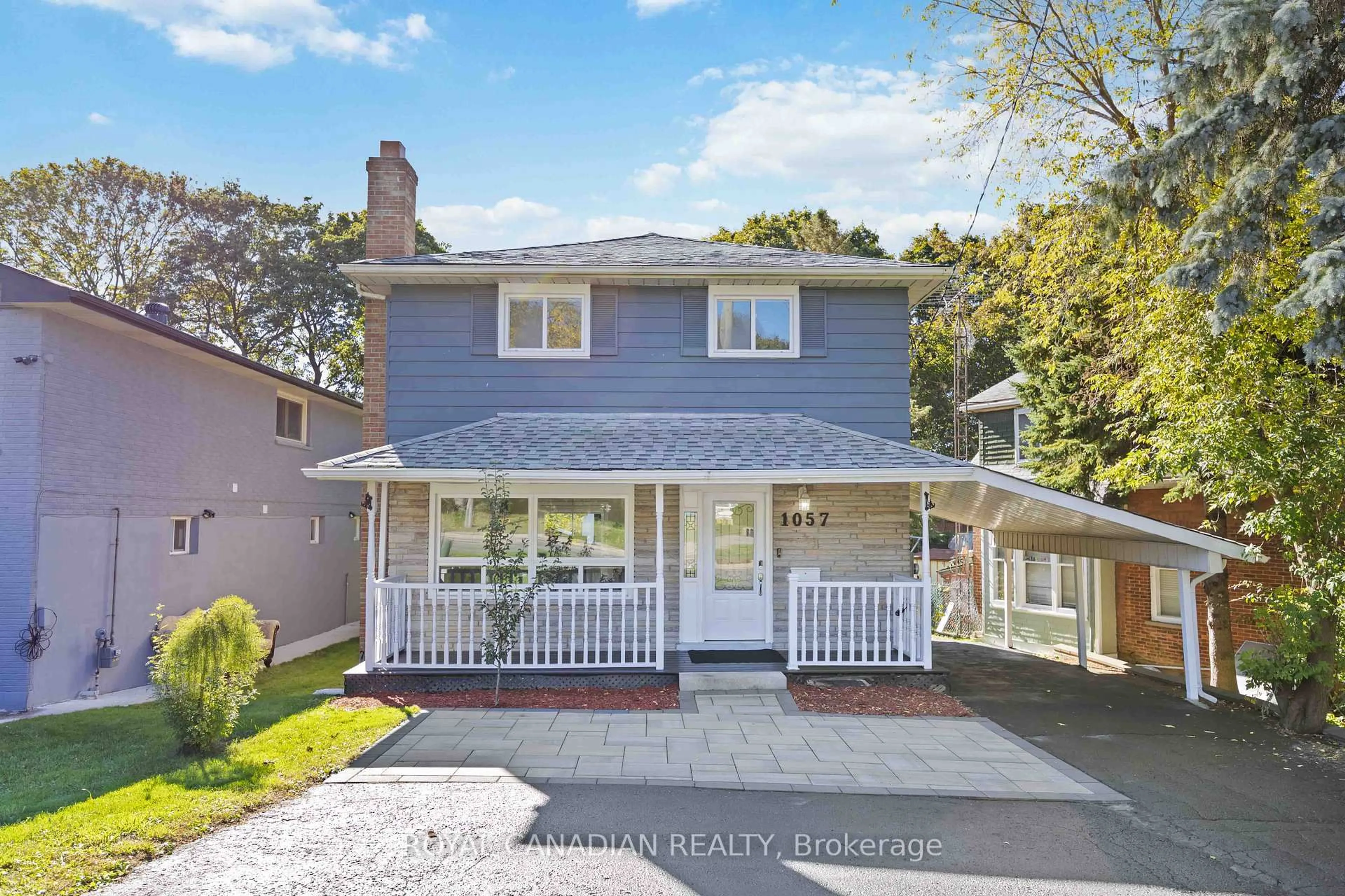 Home with vinyl exterior material, street for 1057 King St, Oshawa Ontario L1H 1H6