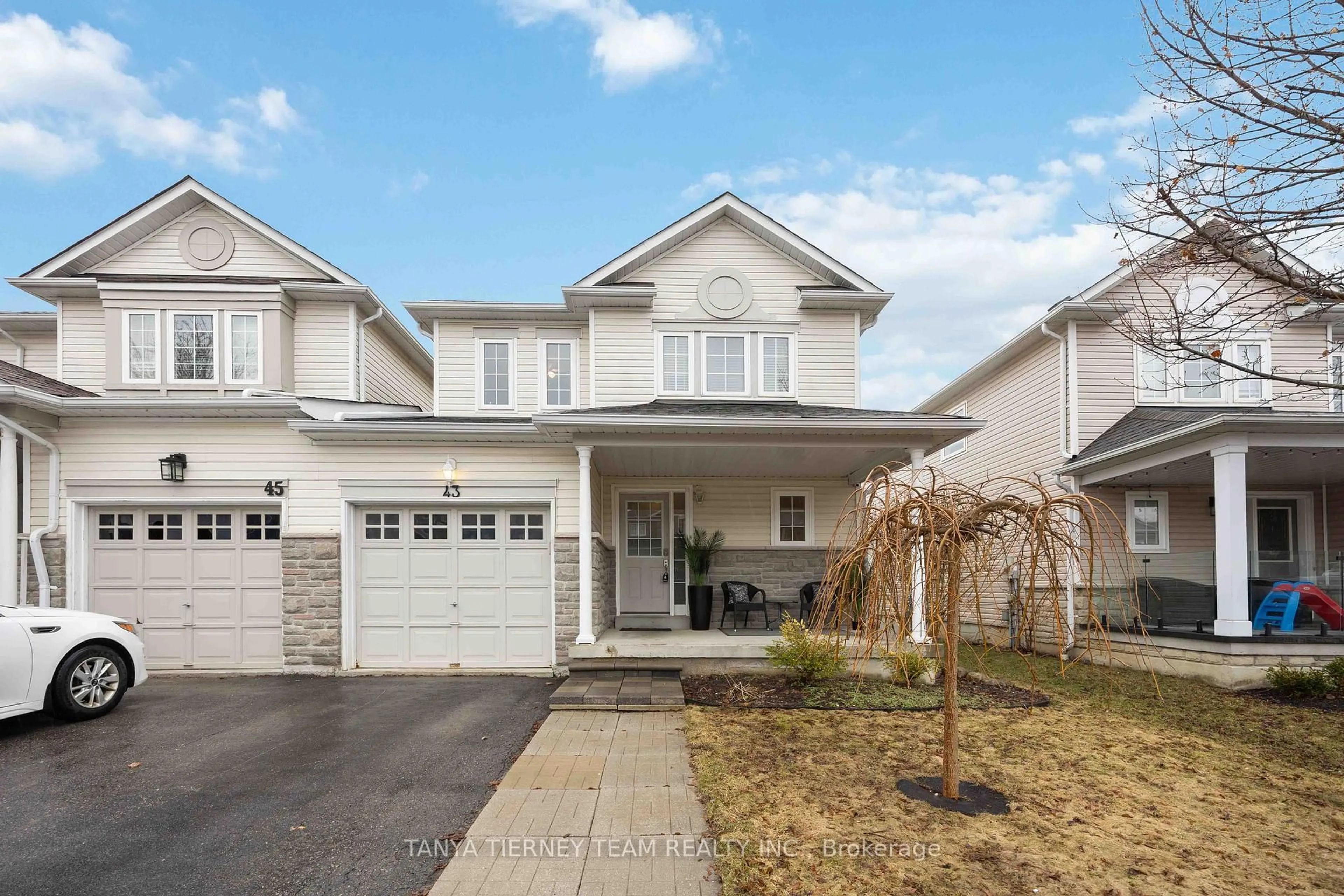 Home with vinyl exterior material, street for 43 Corianne Ave, Whitby Ontario L1M 2H9