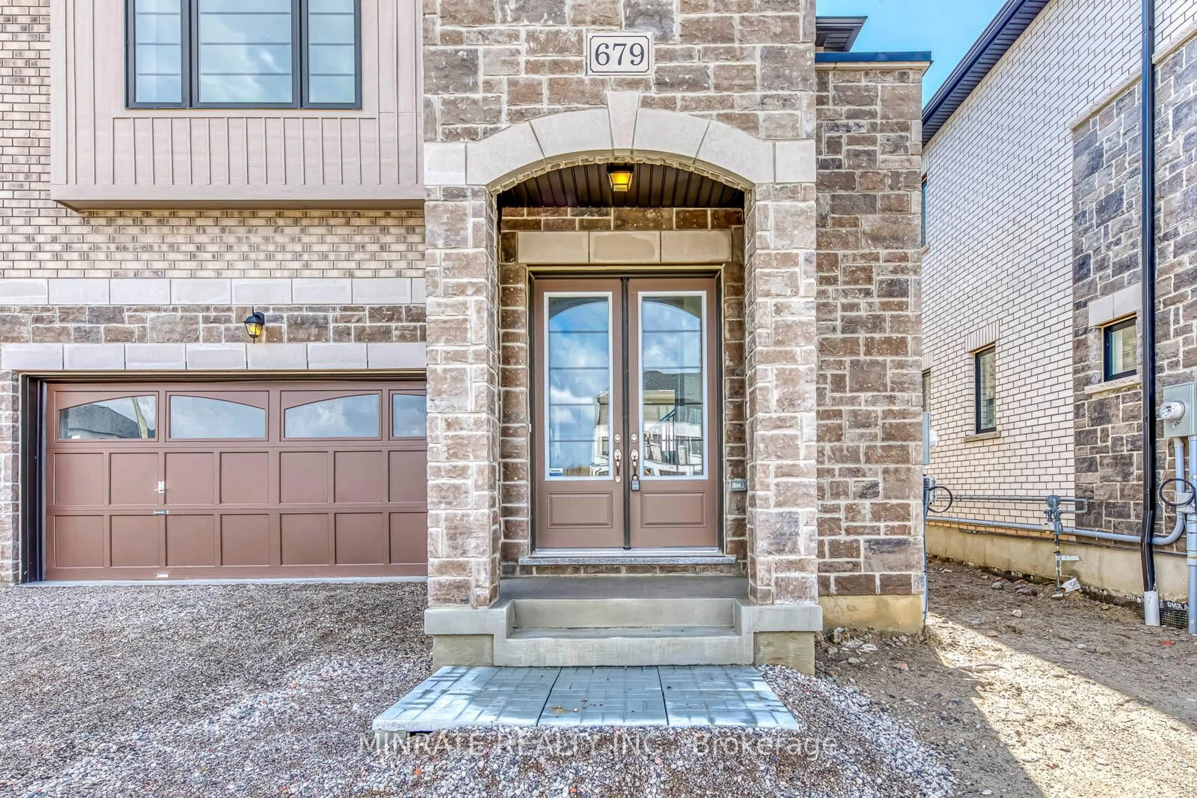 Home with brick exterior material, street for 679 Catalina Manr, Pickering Ontario L1X 0V2