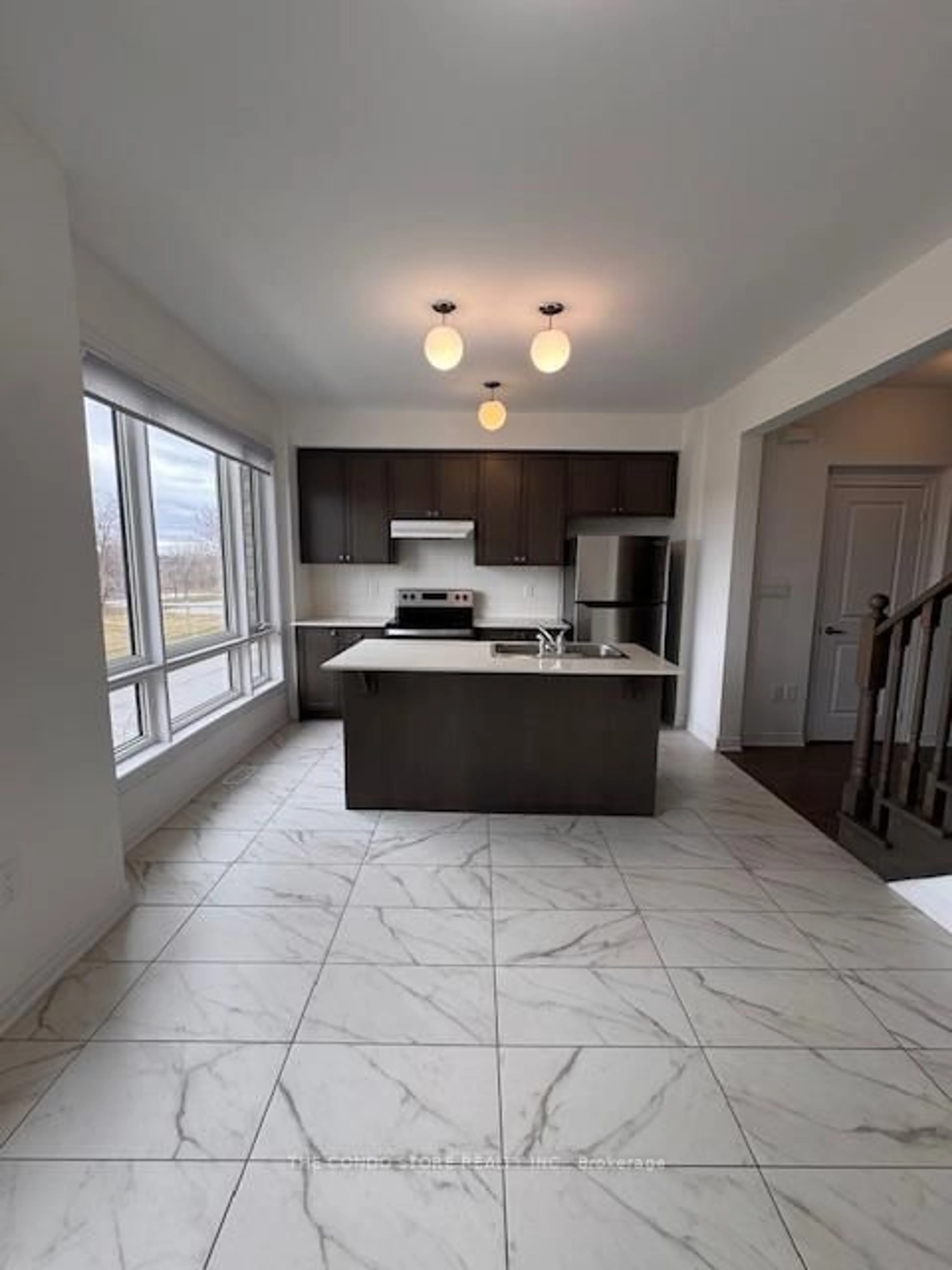 Open concept kitchen, ceramic/tile floor for 19 Haydock Way, Whitby Ontario L1N 0M6