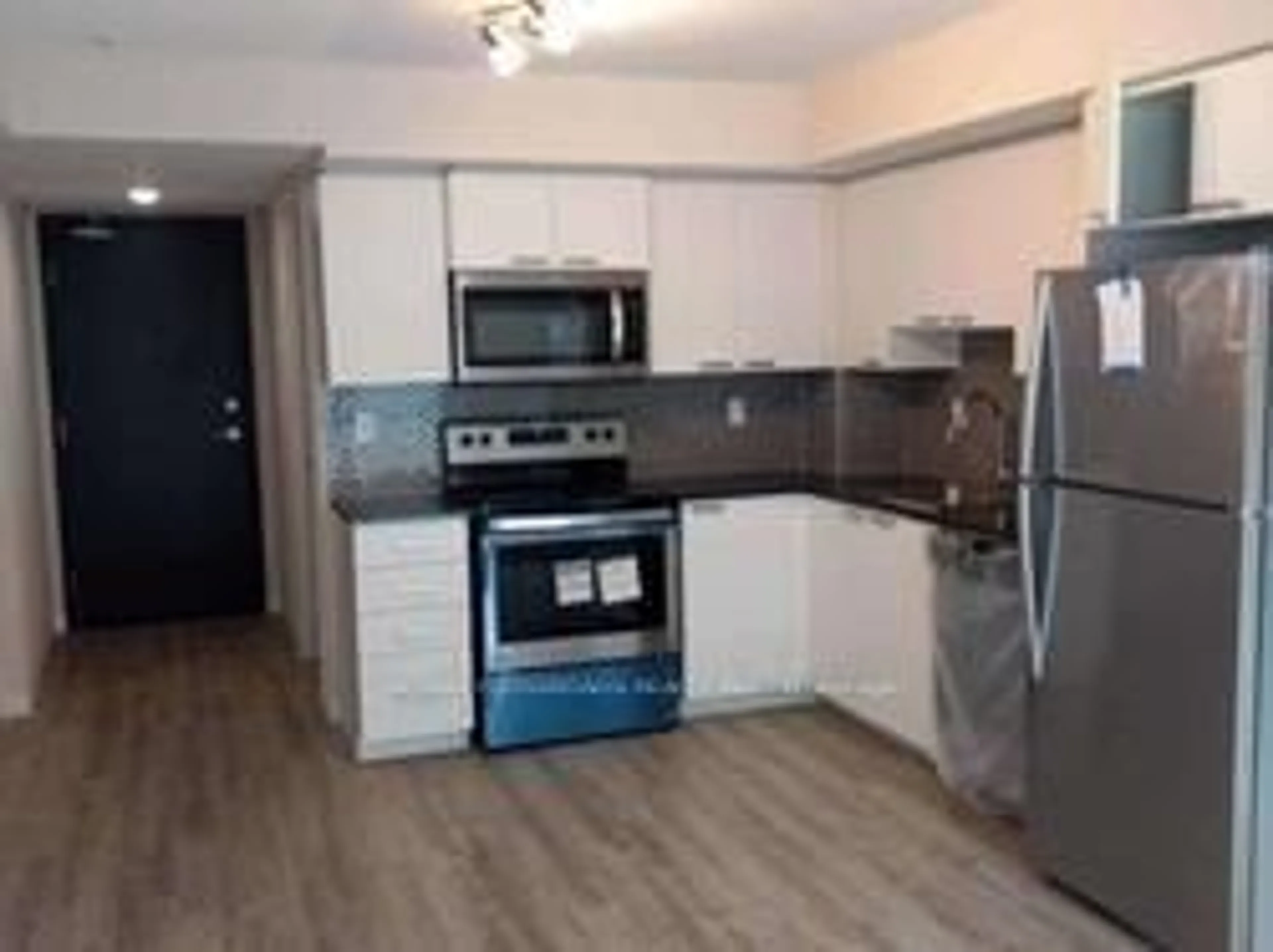 Standard kitchen, wood/laminate floor for 2152 Lawrence Ave #805, Toronto Ontario M1R 0B5