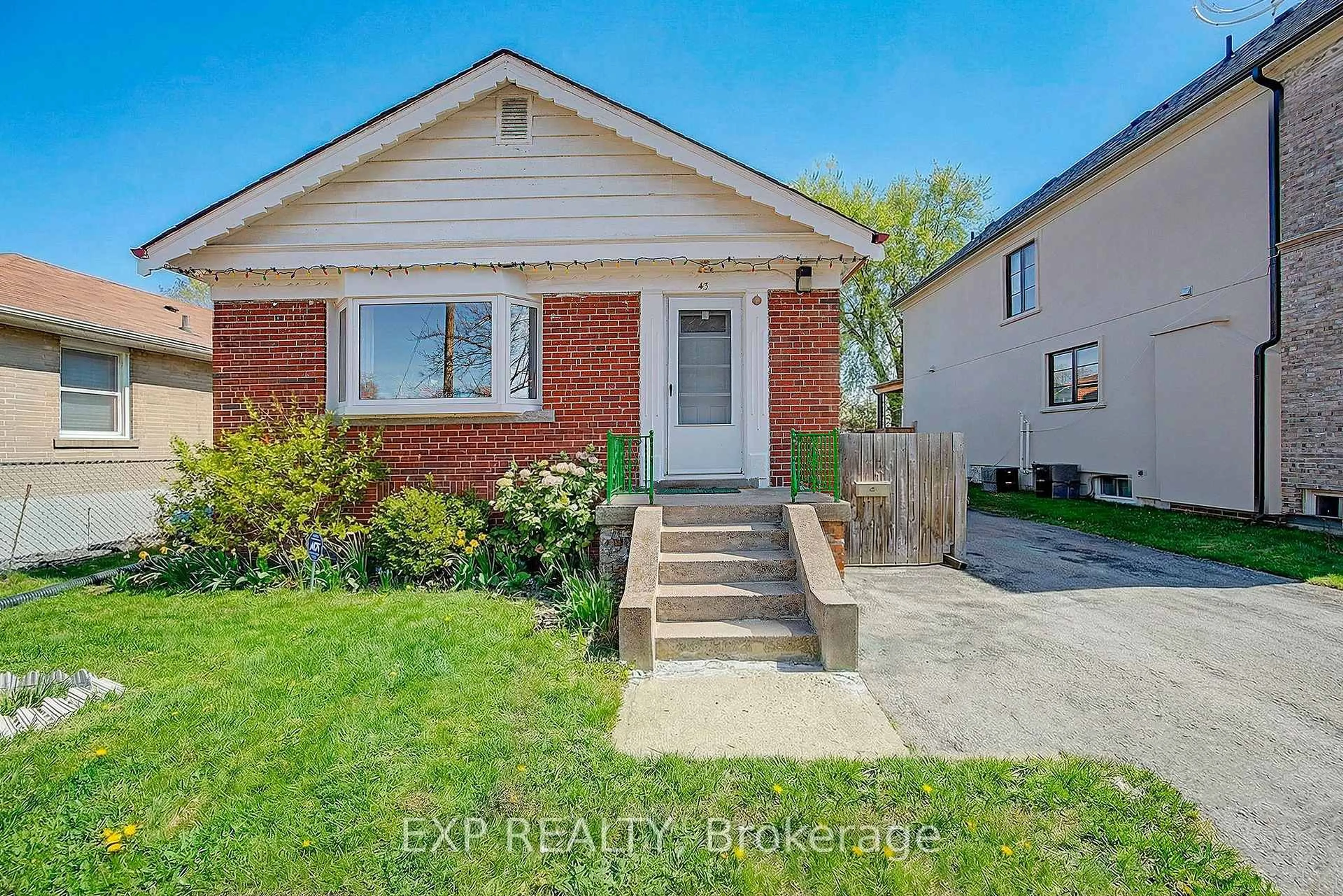 Home with brick exterior material, street for 43 Yorkshire Rd, Toronto Ontario M1K 3B7