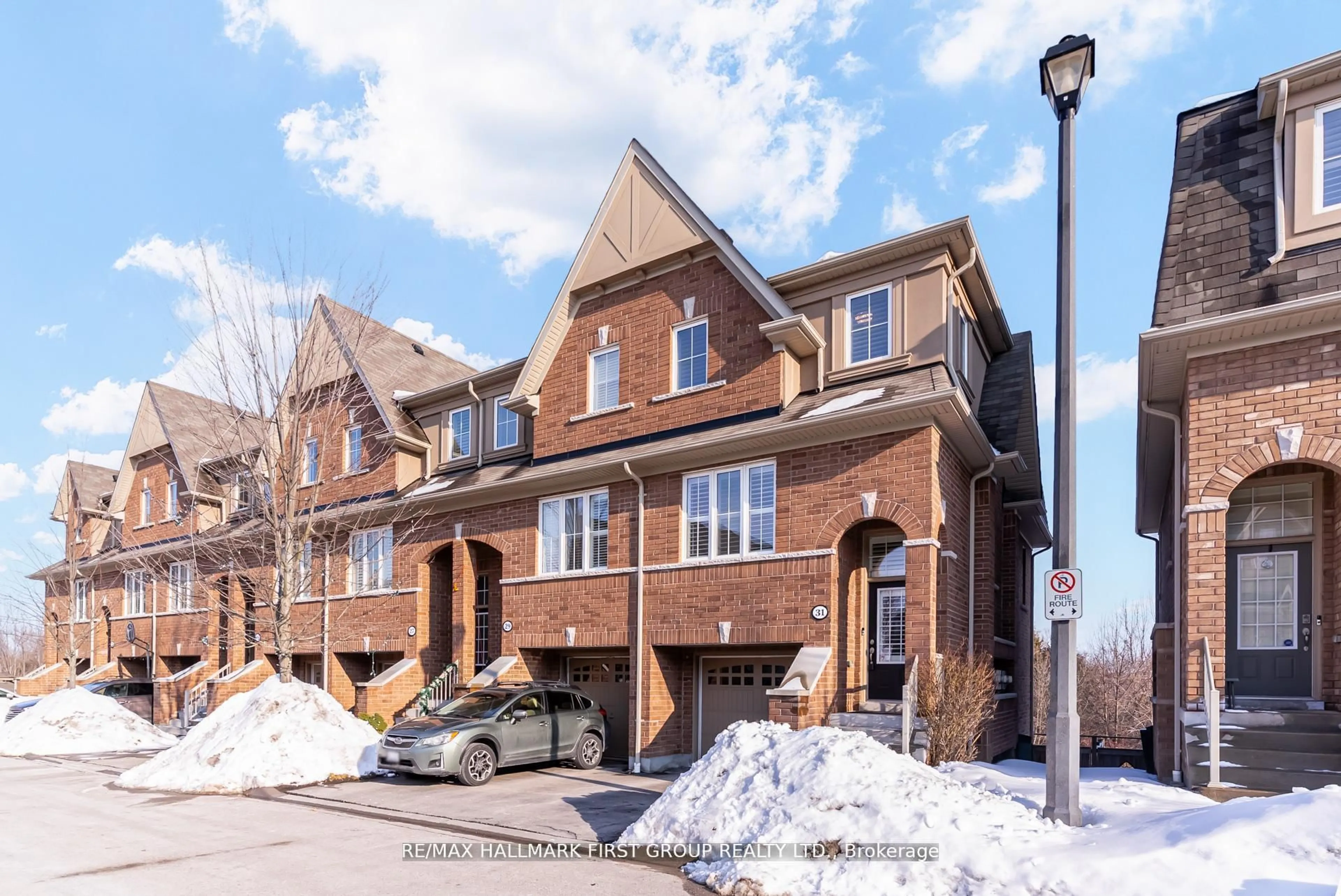 Home with brick exterior material, street for 31 Reevesmere Lane, Ajax Ontario L1Z 0L3