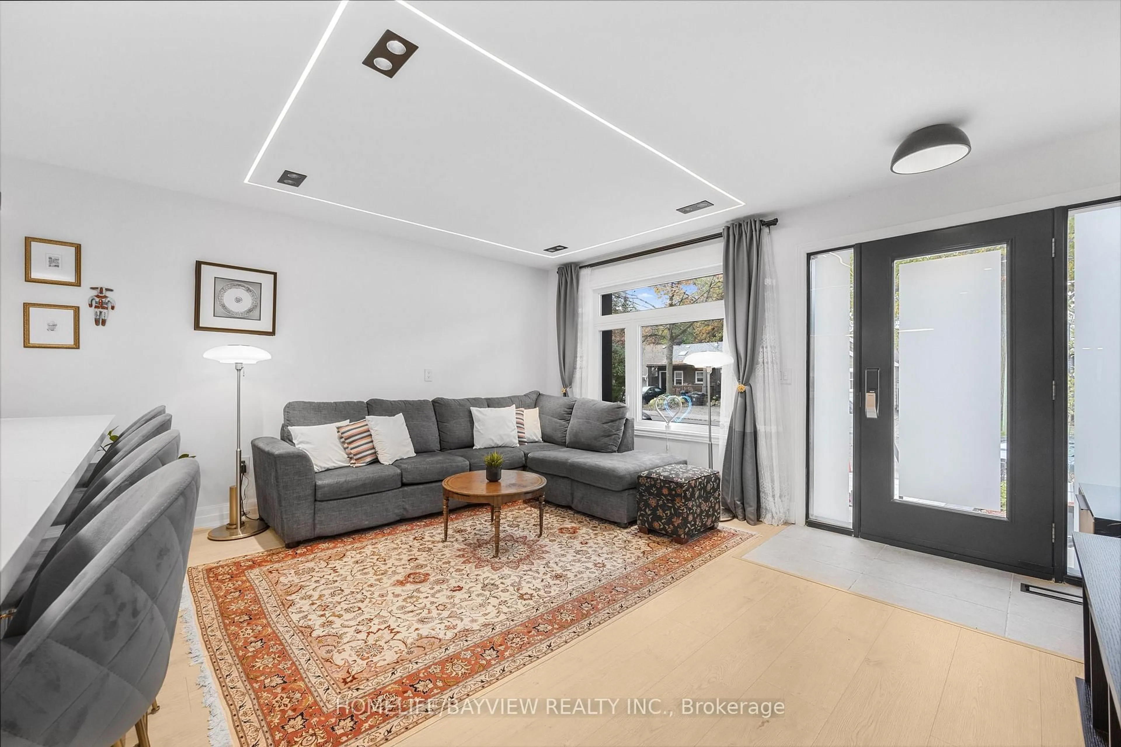 Living room with furniture, unknown for 9 Kenworthy Ave, Toronto Ontario M1L 3B1