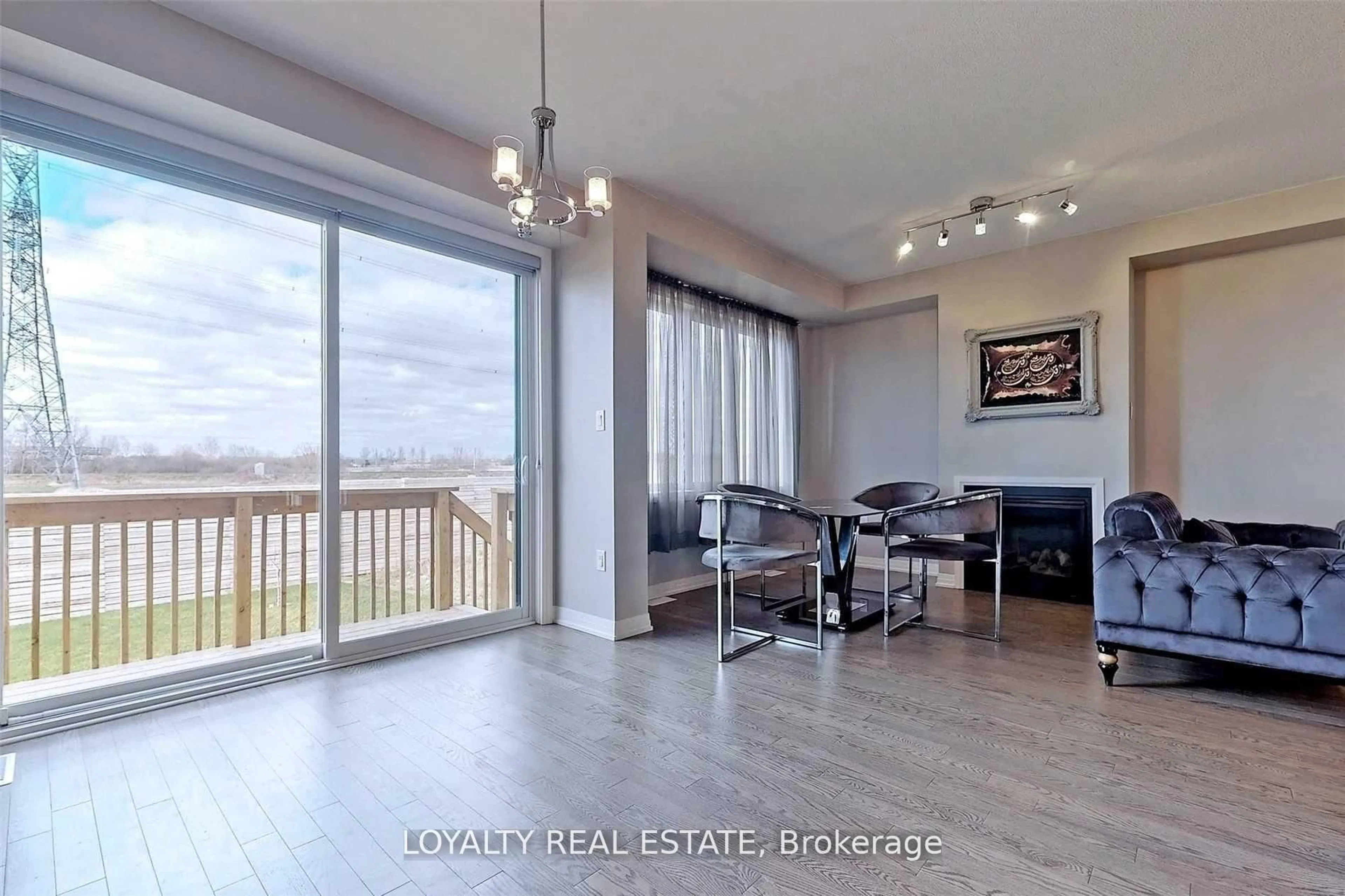 Living room with furniture, wood/laminate floor for 127 Yacht Dr, Clarington Ontario L1C 4A7