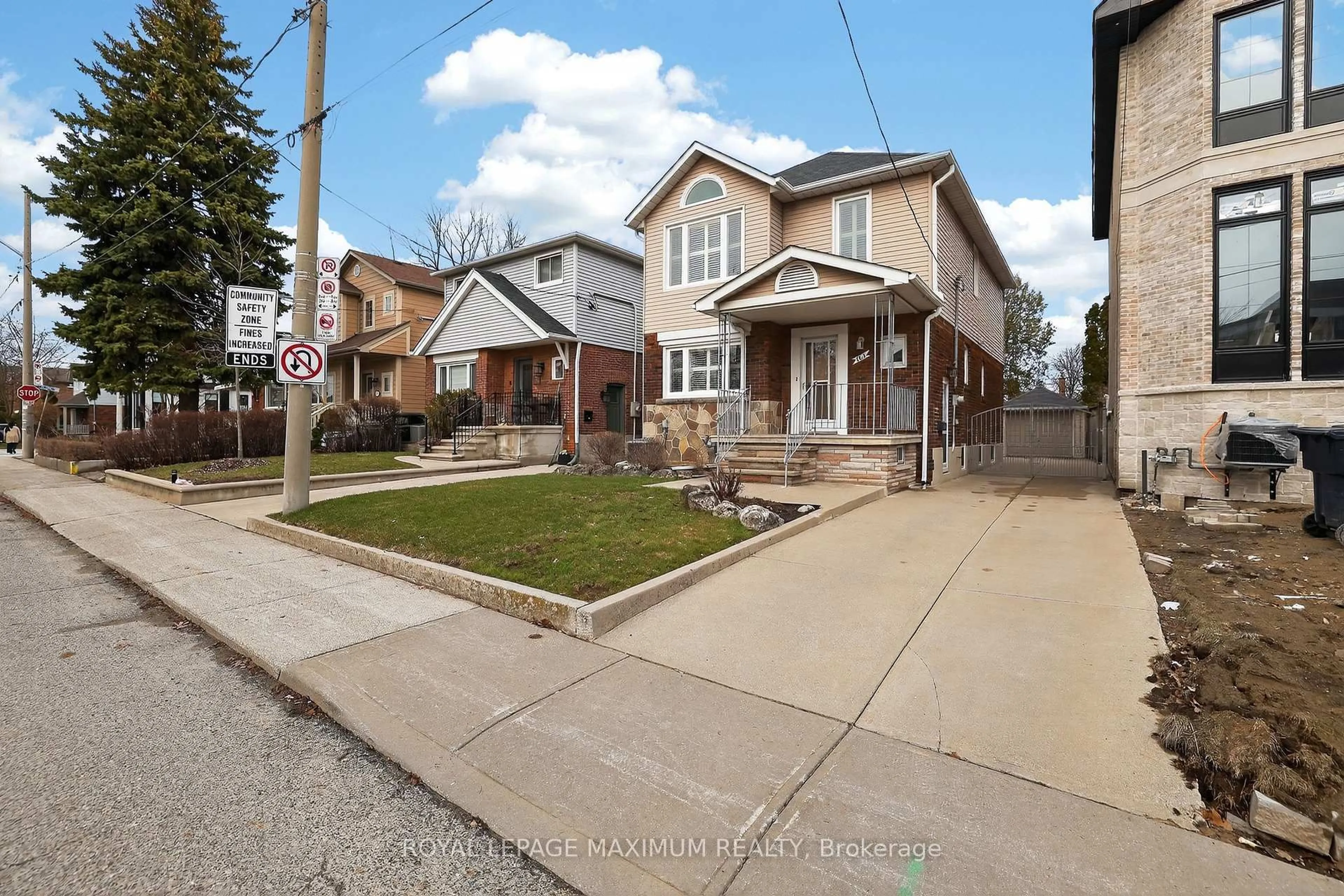 Home with brick exterior material, street for 163 Durant Ave, Toronto Ontario M4J 4W4