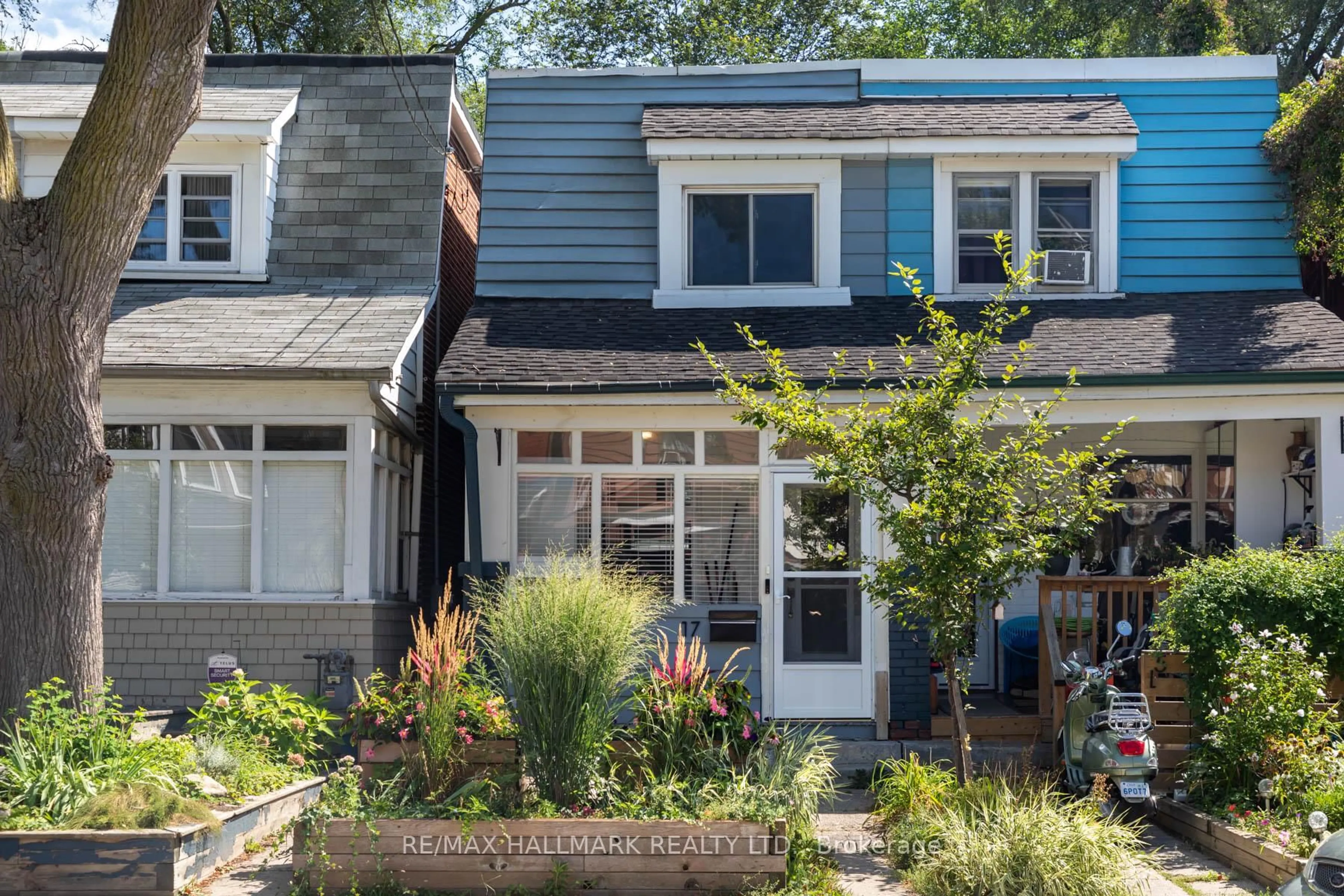 Home with brick exterior material, street for 17 Mountalan Ave, Toronto Ontario M4J 1H3