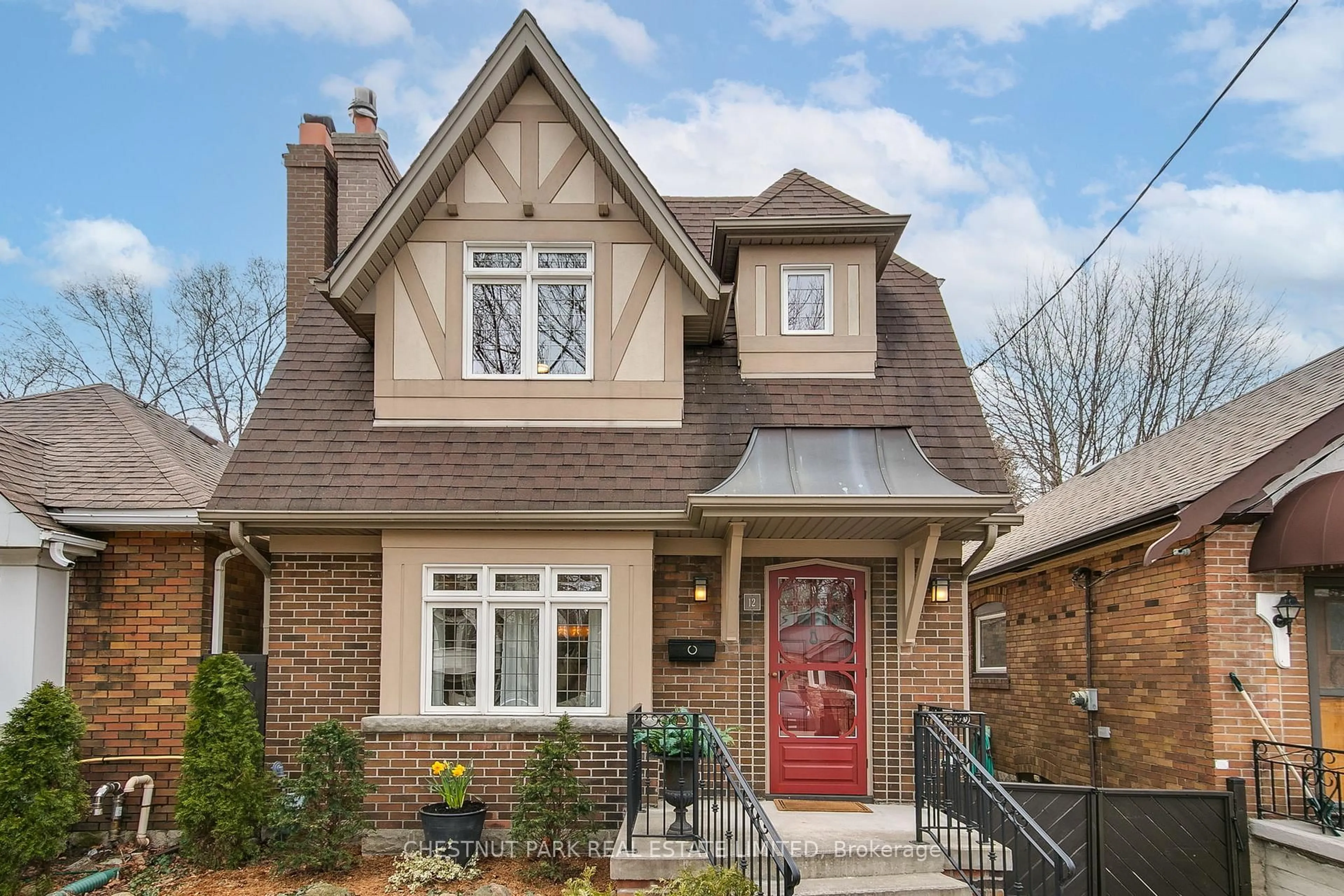 Home with brick exterior material, street for 12 Chilton Rd, Toronto Ontario M4J 3C6