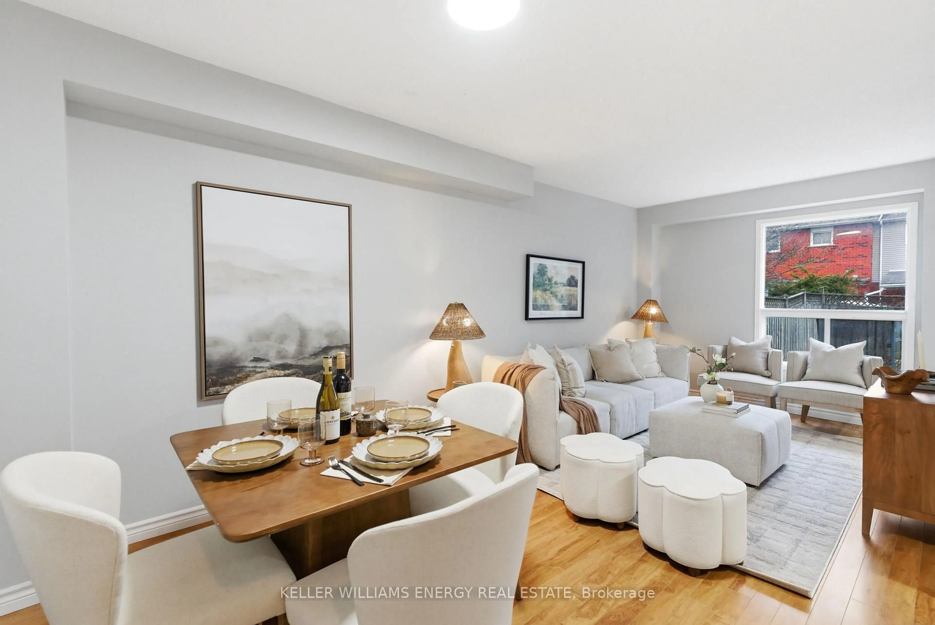 Living room with furniture, wood/laminate floor for 37 Moulton Crt, Clarington Ontario L1E 2W4