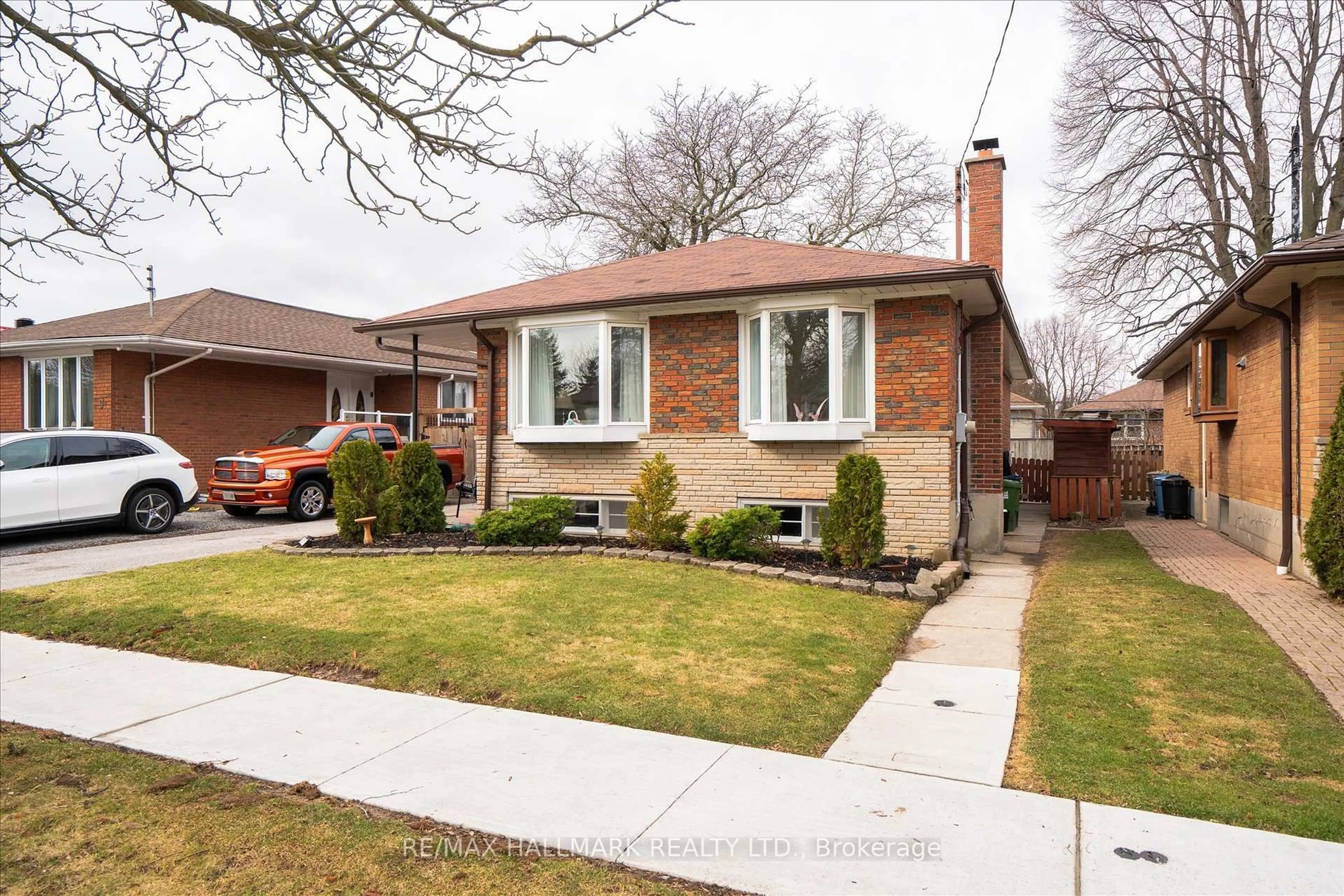 Home with brick exterior material, street for 7 Grassington Cres, Toronto Ontario M1G 1X4