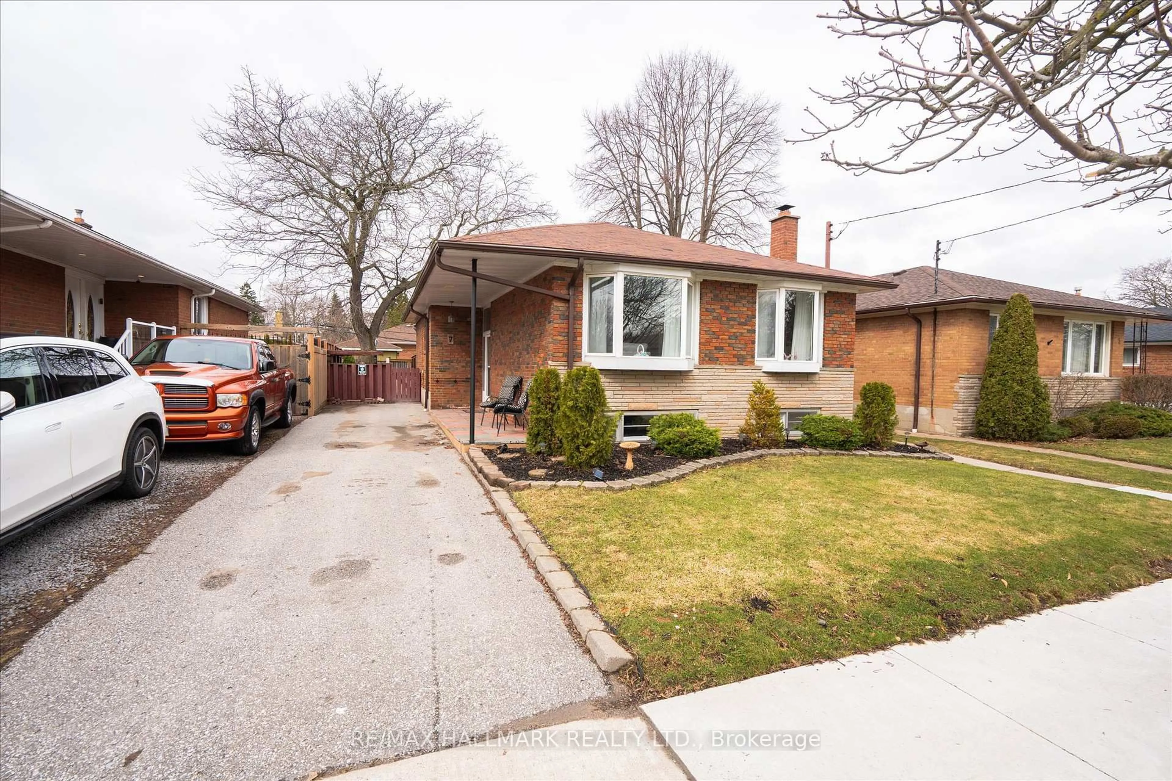 Home with brick exterior material, street for 7 Grassington Cres, Toronto Ontario M1G 1X4