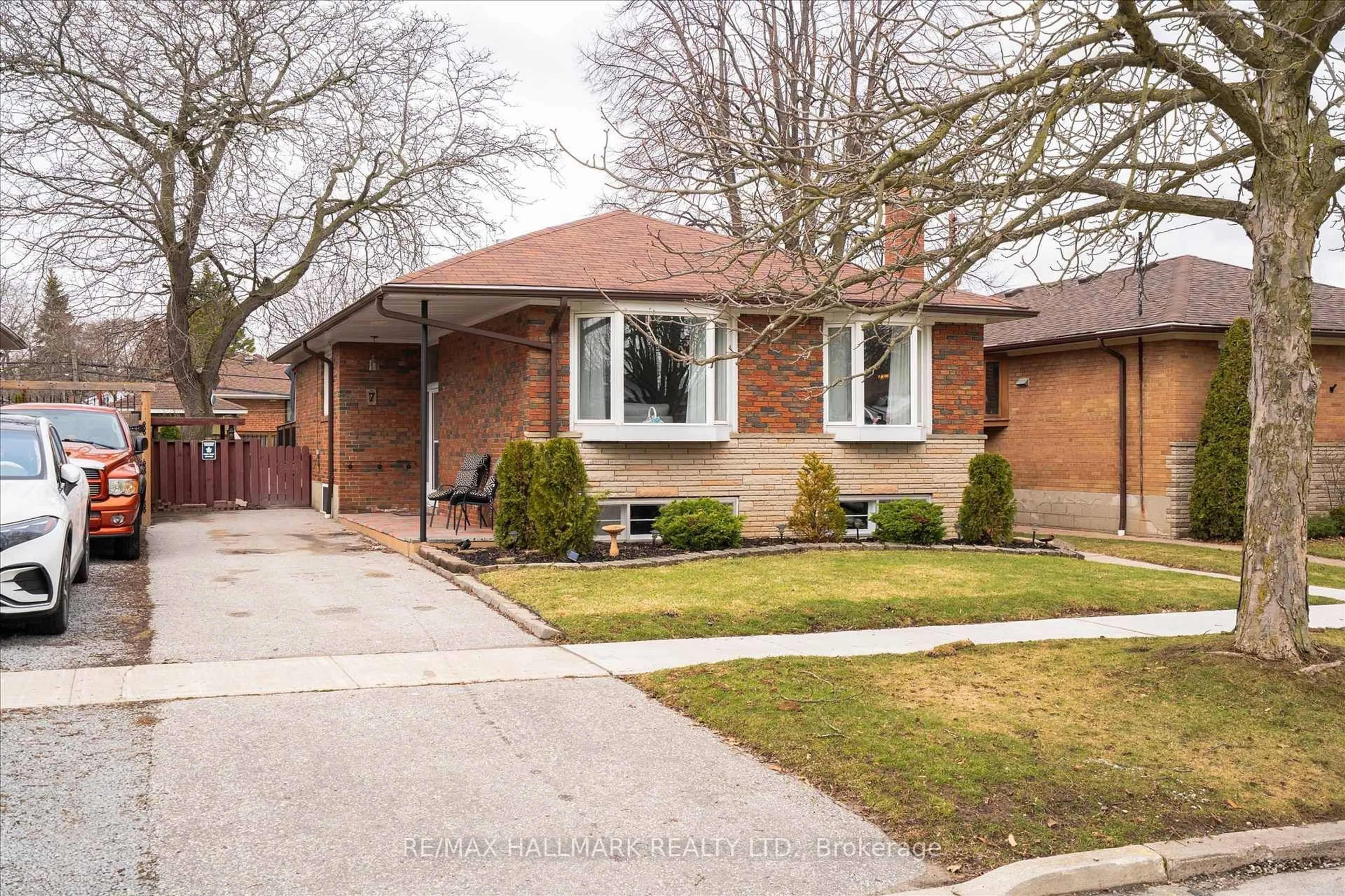 Home with brick exterior material, street for 7 Grassington Cres, Toronto Ontario M1G 1X4