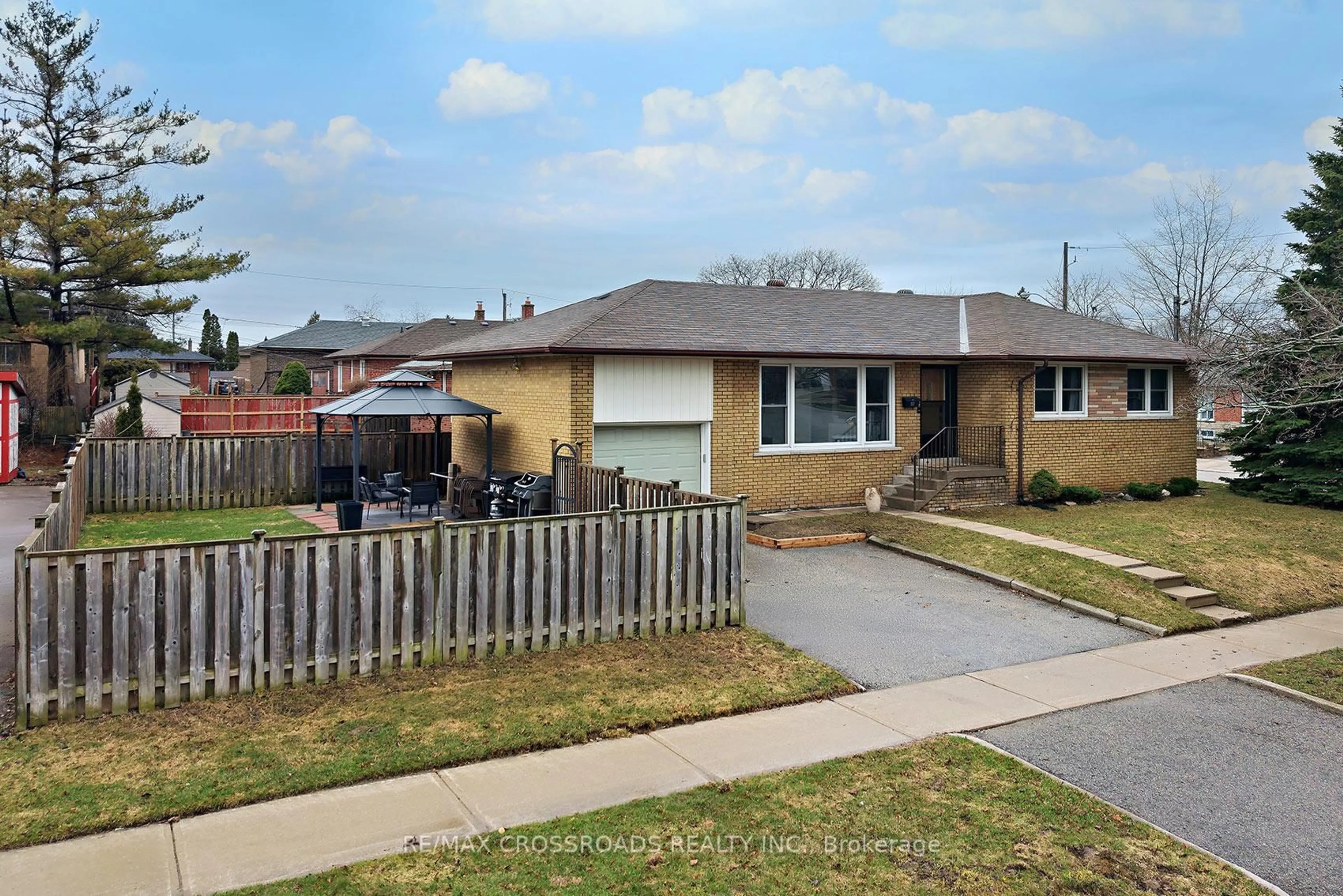 Home with brick exterior material, street for 32 Kim Crt, Toronto Ontario M1K 3R6