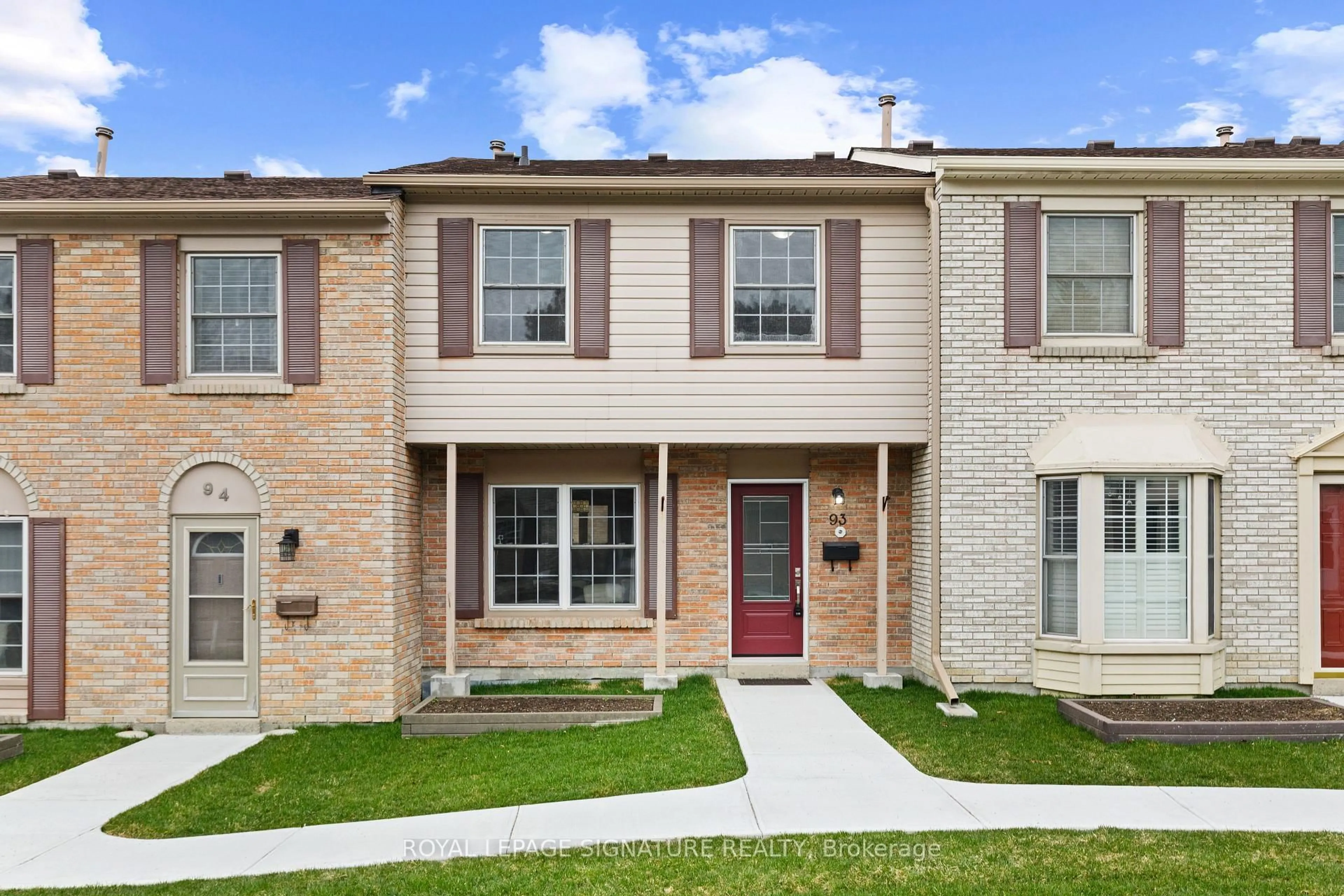 Home with brick exterior material, street for 580 Eyer Dr #93, Pickering Ontario L1W 3B7