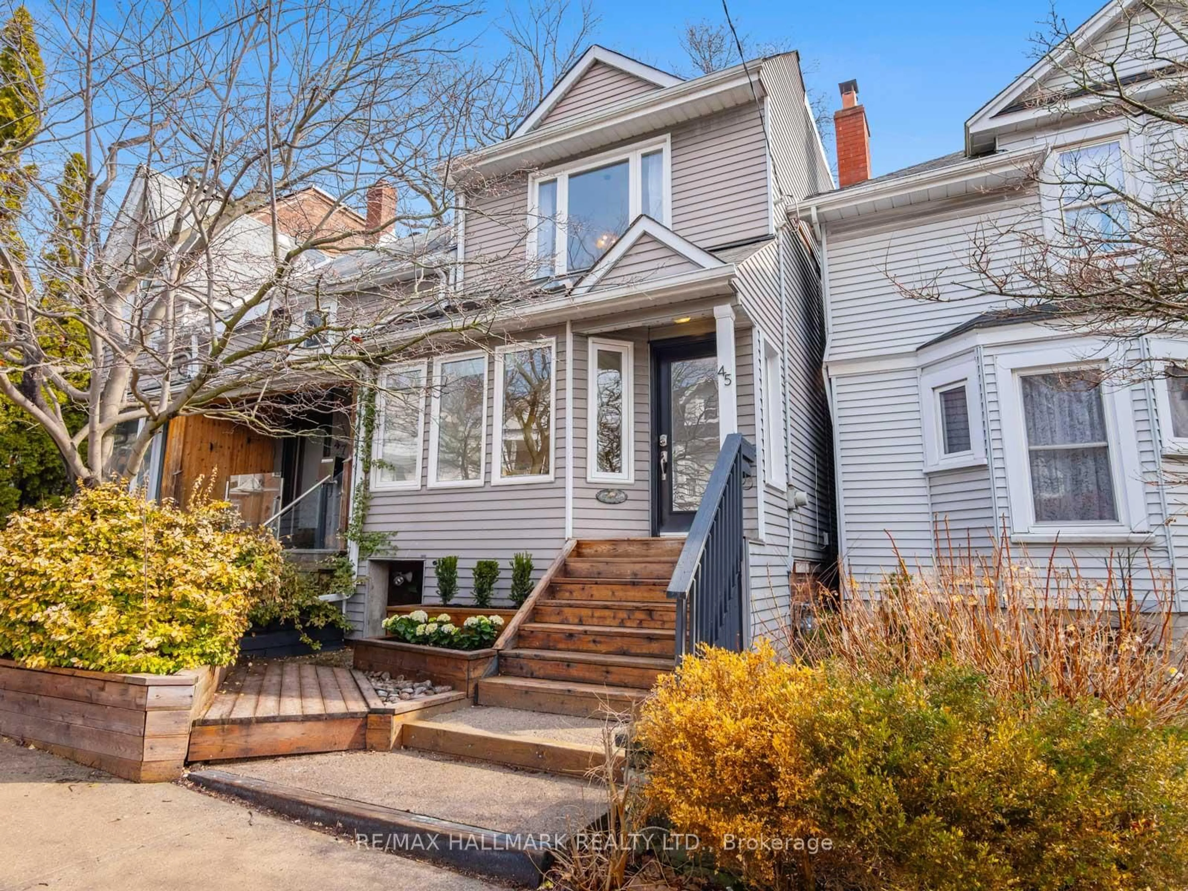 Home with brick exterior material, street for 45 Wheeler Ave, Toronto Ontario M4L 3V3