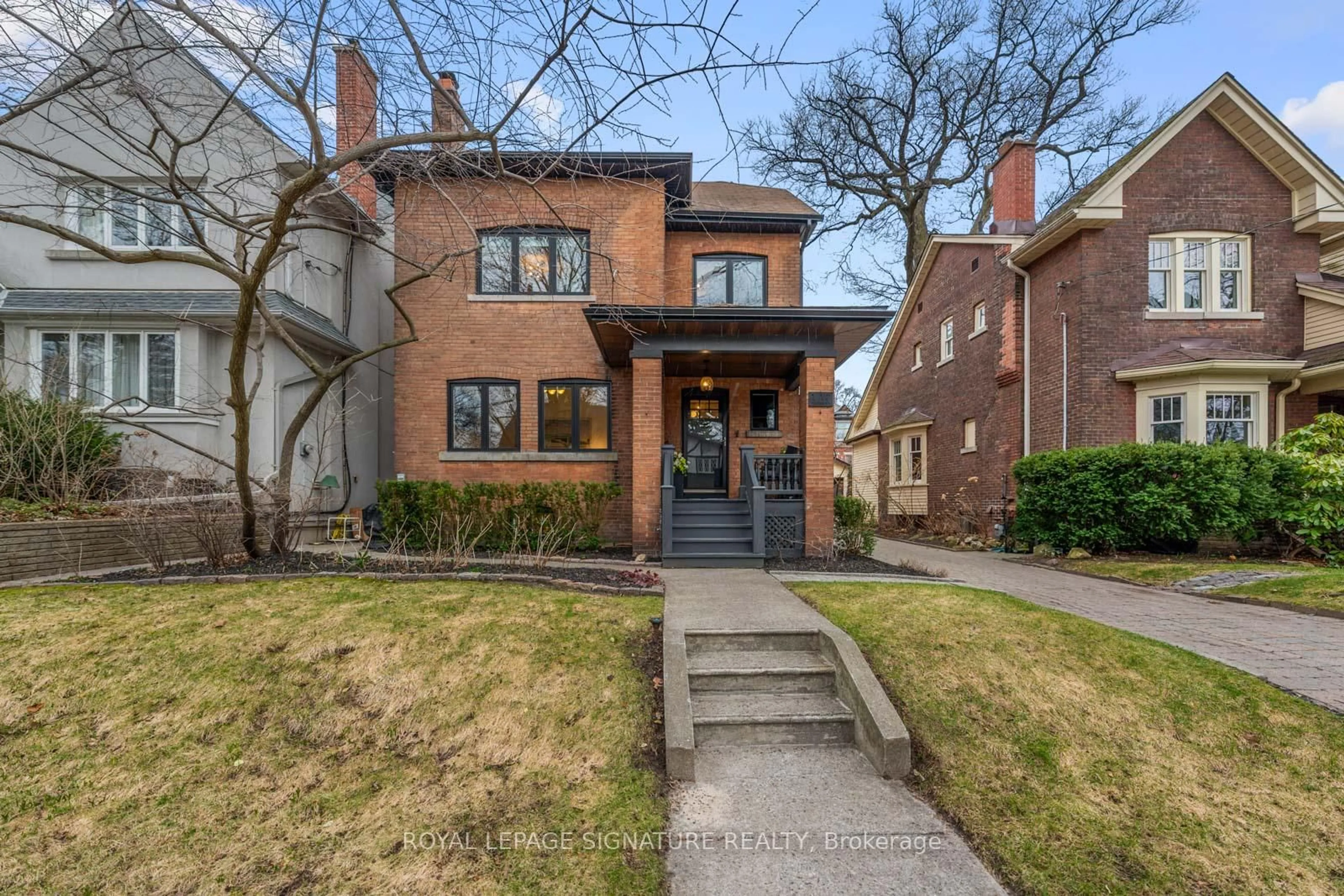 Home with brick exterior material, street for 143 Maclean Ave, Toronto Ontario M4E 3A5