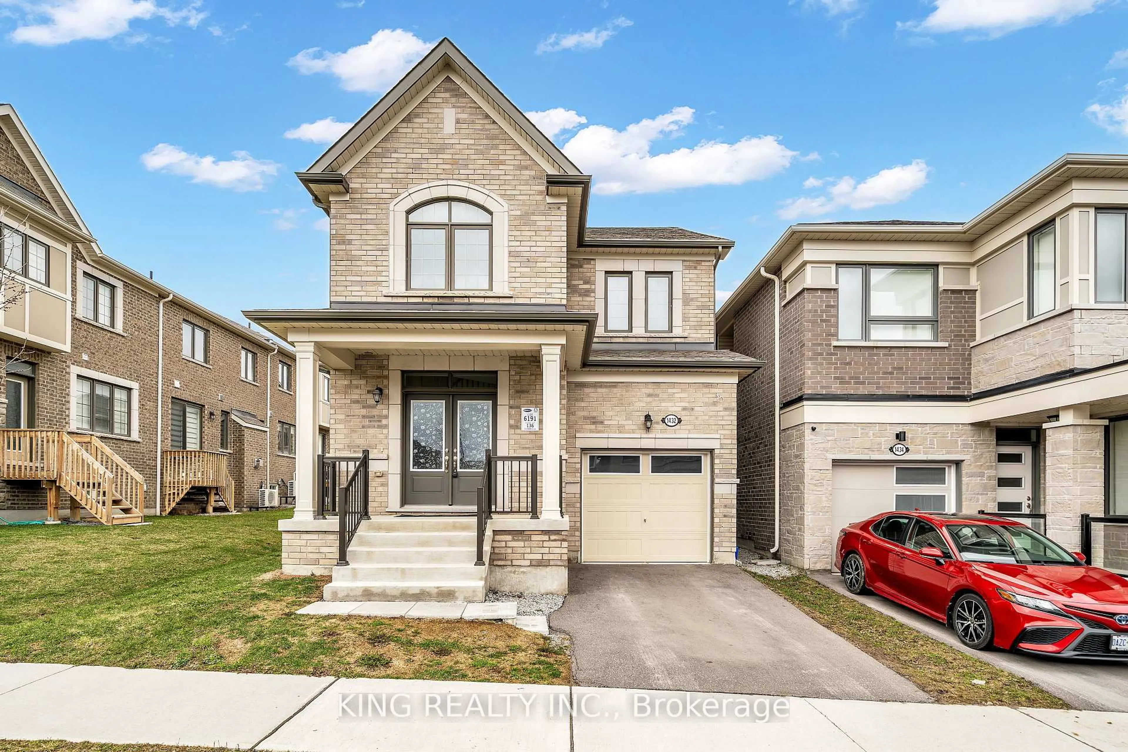 Home with brick exterior material, street for 1432 Waterthrush Lane, Pickering Ontario L1X 0M9