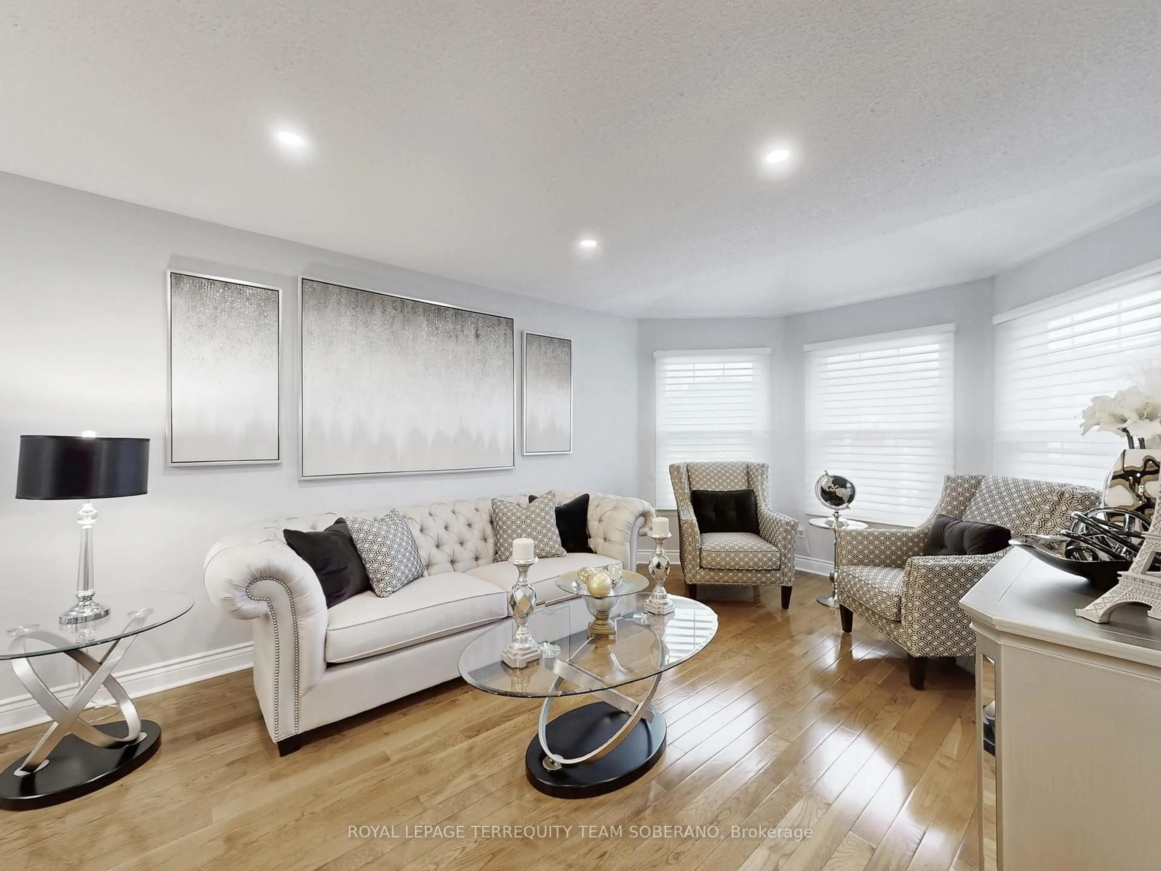 Living room with furniture, wood/laminate floor for 1549 Saugeen Dr, Pickering Ontario L1V 5P9