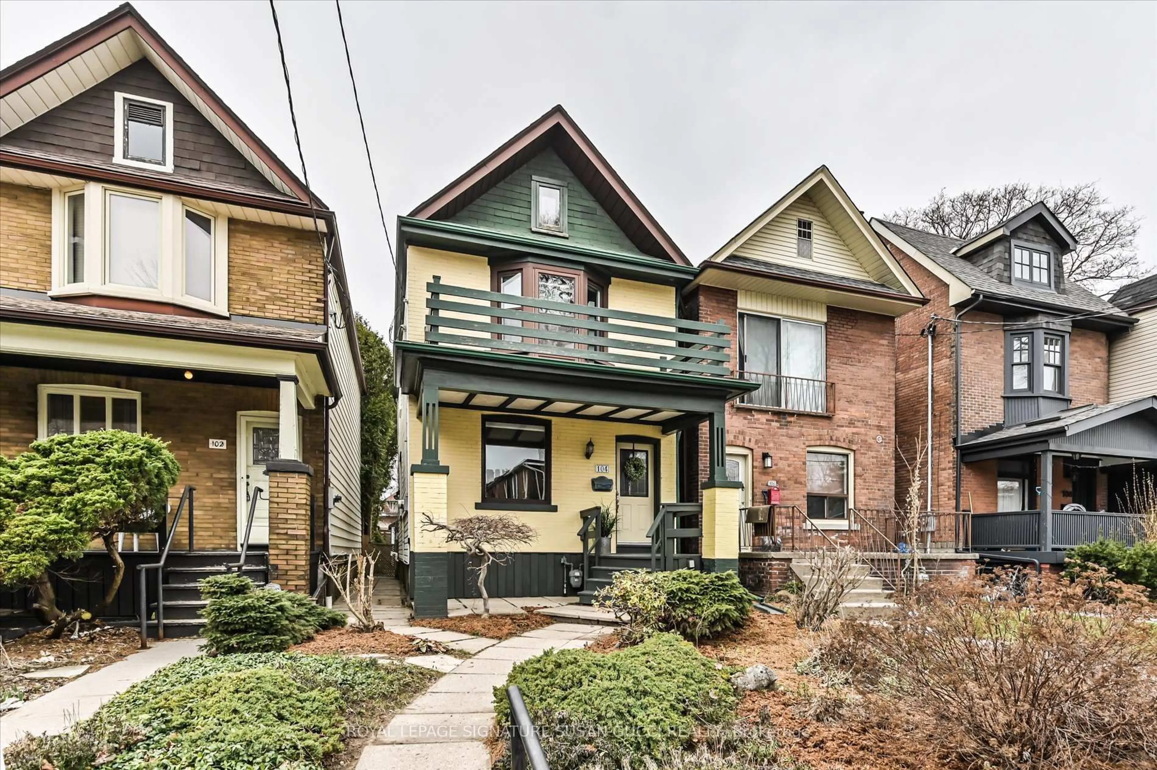 Home with brick exterior material, street for 104 Dewhurst Blvd, Toronto Ontario M4J 3J3