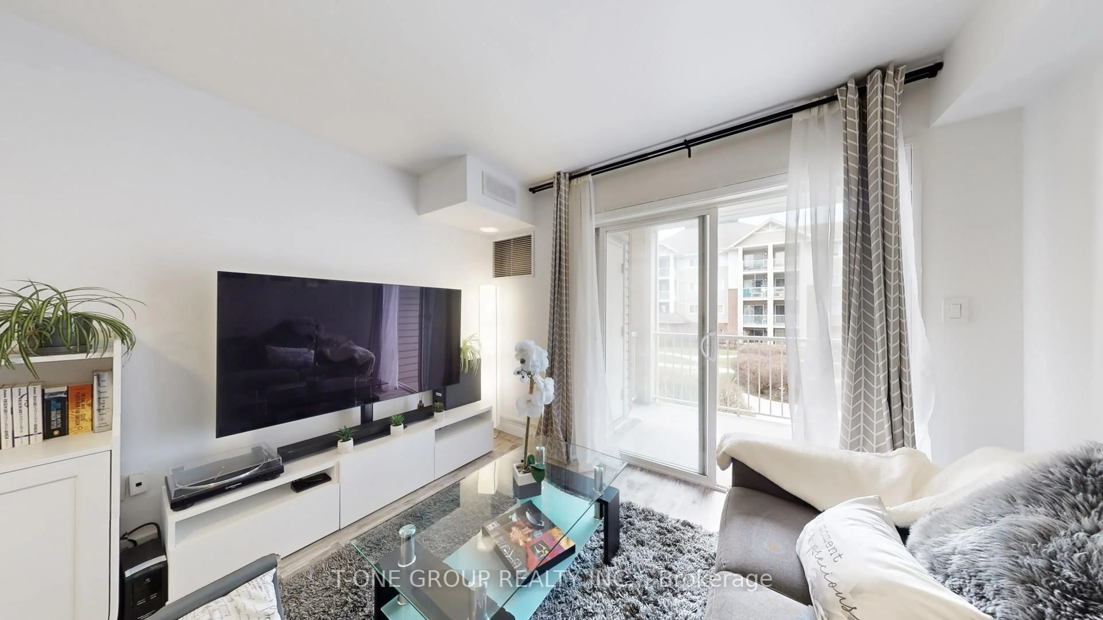 Living room with furniture, unknown for 5225 Finch Ave #217, Toronto Ontario M1S 5W8